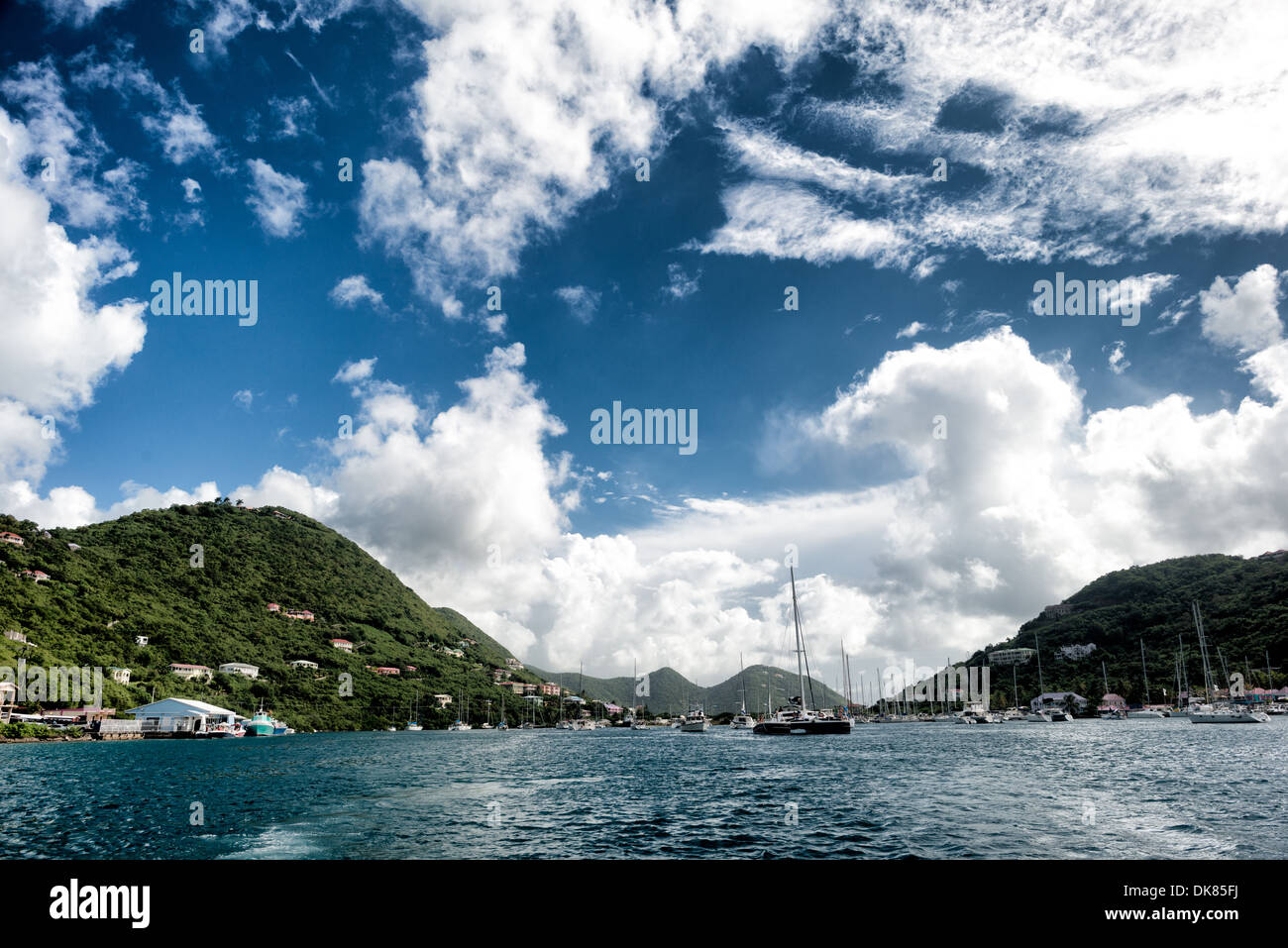 The habour at West End on Tortola in the British Virgin Islands, with Tortola on the left and Frenchman's Cay on the right. Known for its diverse marine life and coral reefs, the Caribbean region boasts some of the world's most beautiful and well-preserved beachscapes. Stock Photo