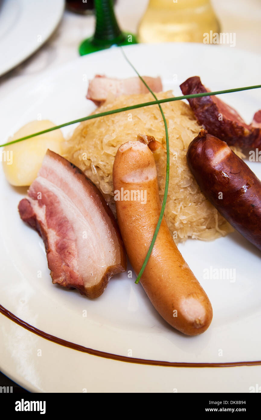 Alsatian Specialty Sauerkraut with Sausage and Ham Stock Photo - Alamy
