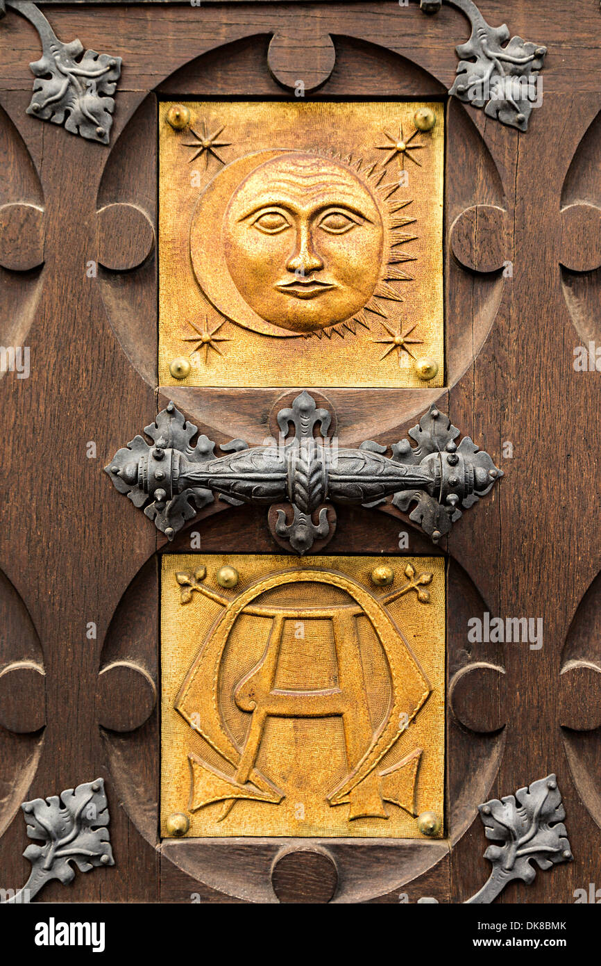 Sun and A symbol on door to the Augustinian abbey of St Thomas where ...