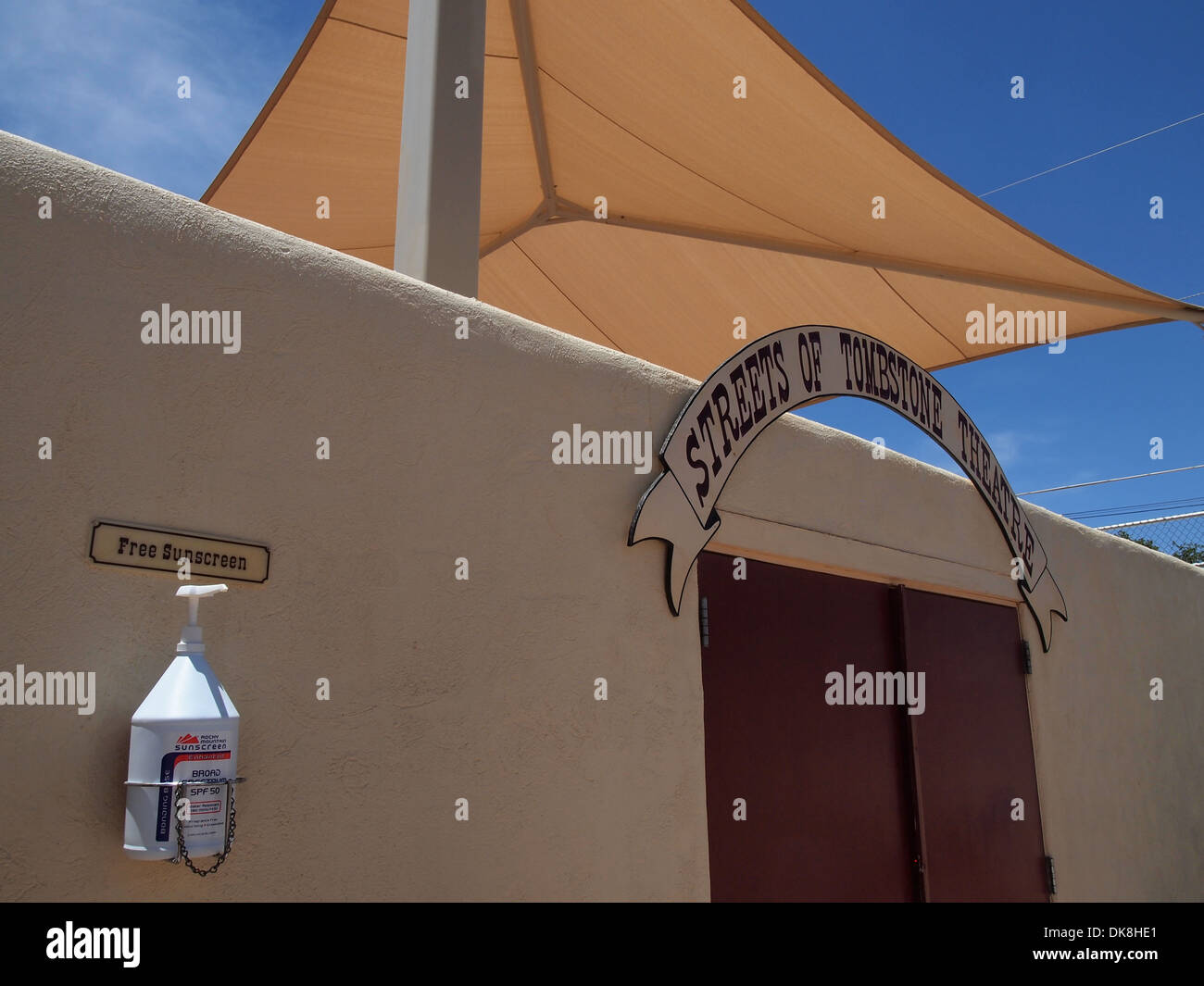 Free sunscreen offered at the entrance to the Streets of Tombstone Theatre in the American Old West of Tombstone, Arizona, USA Stock Photo