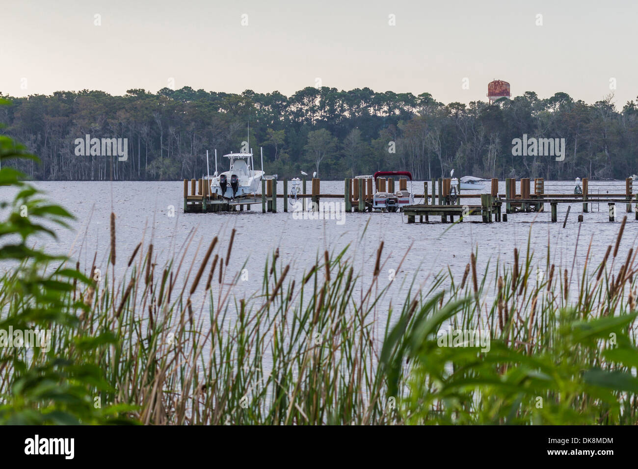 Private fishing boat at dock on St. Johns River in Green Cove Springs