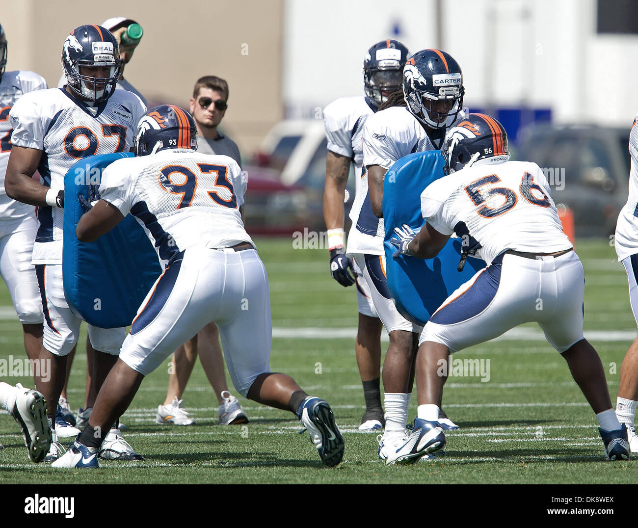 July 31, 2011 - Centennial, Colorado, U.S. - DT JEREMY JARMON, left, and DE ROBERT AYERS, RIGHT, practice drills during the Denver Broncos Training Camp Sunday afternoon at Dove Valley in Centennial, Colorado. (Credit Image: © Hector Acevedo/ZUMAPRESS.com) Stock Photo