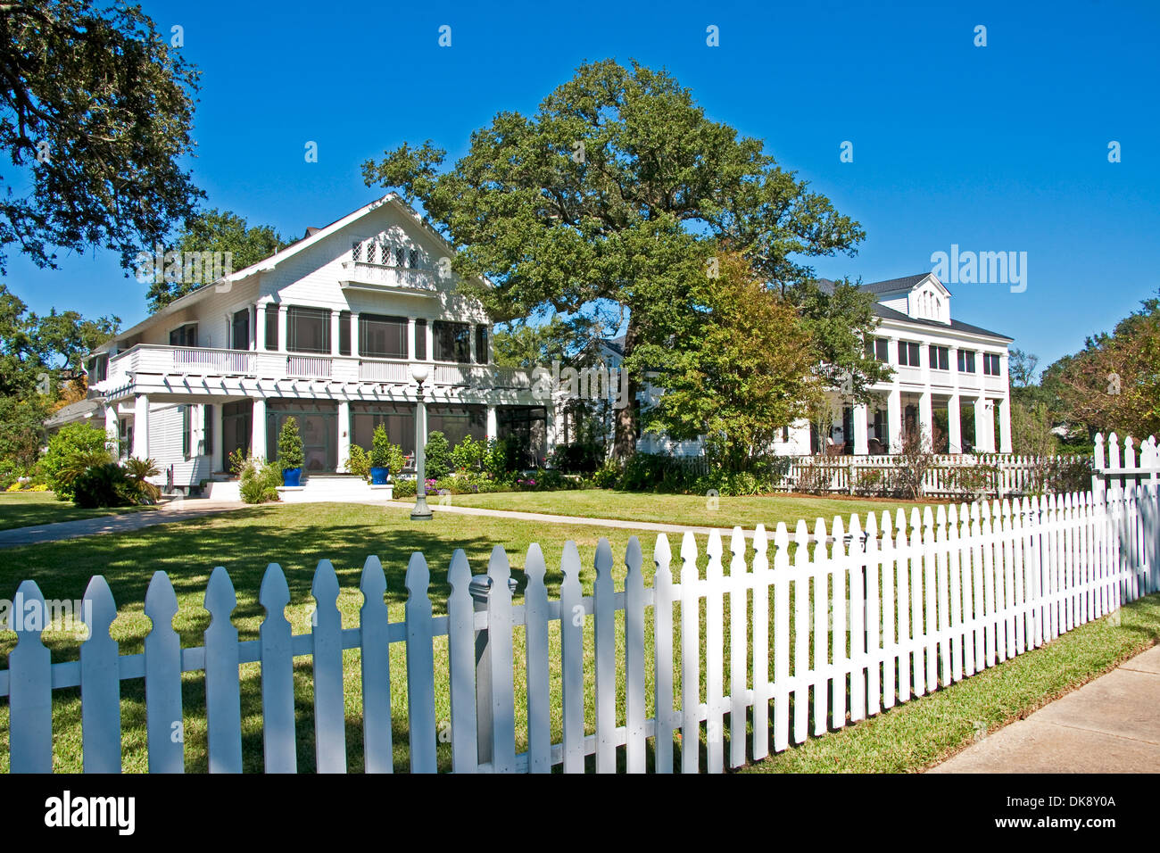 Antebellum homes shaded by oaks along shore of Mississippi Sound on