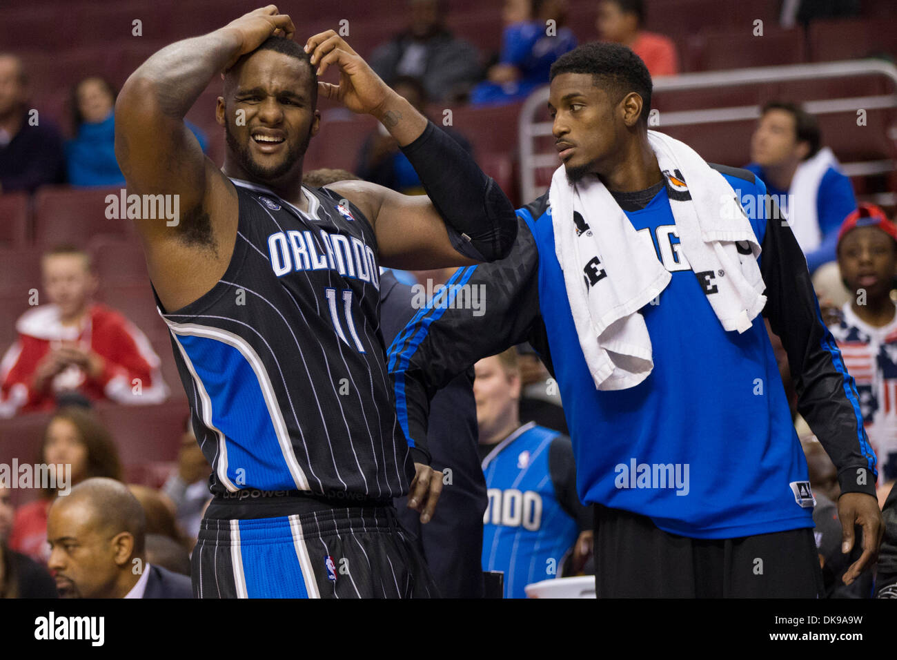 December 3, 2013: Orlando Magic power forward Glen Davis (11) reacts to getting fouled out with power forward Solomon Jones (22) by him during the NBA game between the Orlando Magic and the Philadelphia 76ers at the Wells Fargo Center in Philadelphia, Pennsylvania. The 76ers win 126-125 in double overtime. (Christopher Szagola/Cal Sport Media) Stock Photo