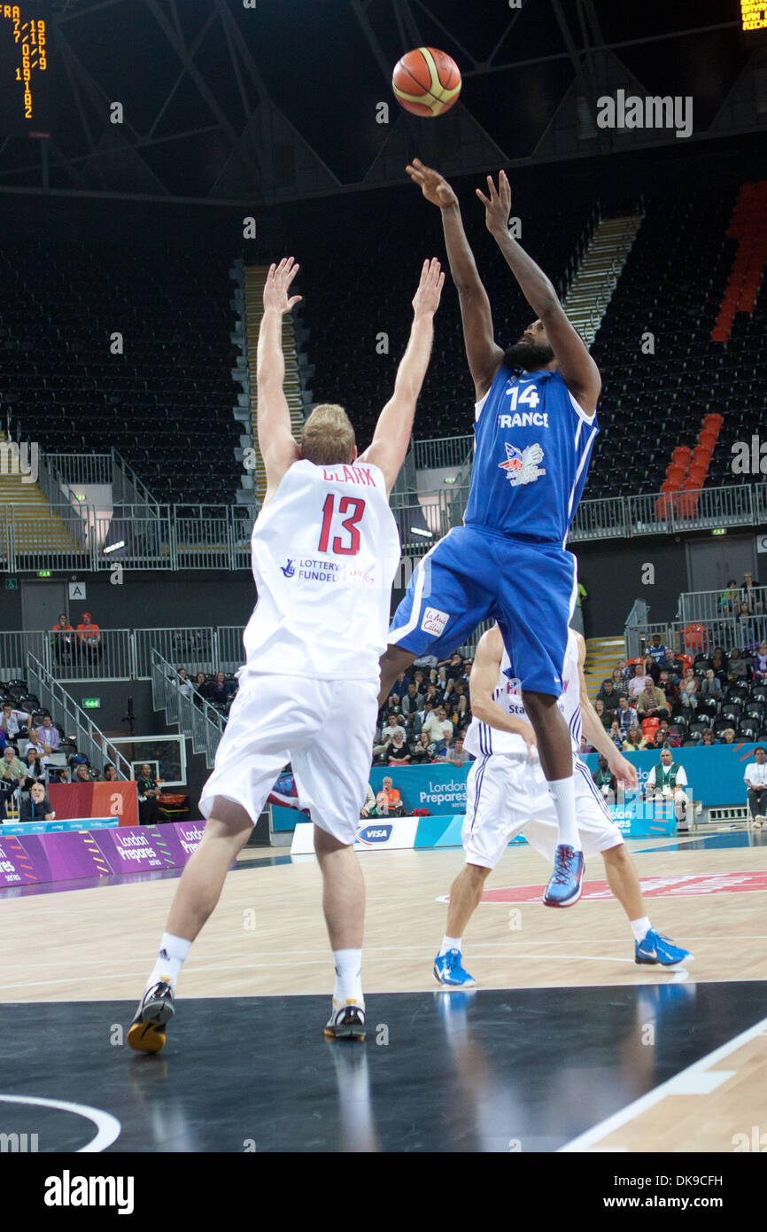 Aug. 16, 2011 - London, United Kingdom - N14 Ronny Turiad from France plays the ball as n.13 Dan Clark from GBR tries to block during the match GBR vs France on the first day of the London Prepares Series - Basketball invitational tournament, preparation event for London 2012 Olympics. (Credit Image: © Marcello Farina/Southcreek Global/ZUMAPRESS.com) Stock Photo