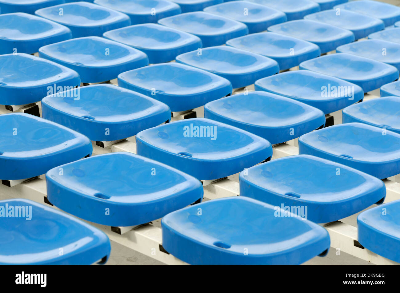 Rows of empty seats in a stadium Stock Photo