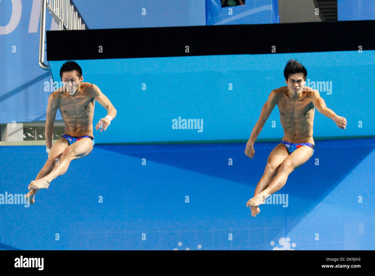 Aug. 22, 2011 - Shenzhen, China - LIN YUE and HUO LIANG youth diving sensations at the 2008 Beijing Olympics, took the gold again in the men's 10 meter synchronized platform competition at the 26th Summer Universiade (World University Games) in Shenzhen. (Credit Image: © Jeremy Breningstall/ZUMAPRESS.com) Stock Photo