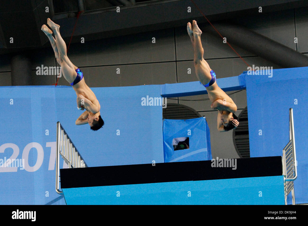 Aug. 22, 2011 - Shenzhen, China - LIN YUE and HUO LIANG youth diving sensations at the 2008 Beijing Olympics, took the gold again in the men's 10 meter synchronized platform competition at the 26th Summer Universiade (World University Games) in Shenzhen. (Credit Image: © Jeremy Breningstall/ZUMAPRESS.com) Stock Photo