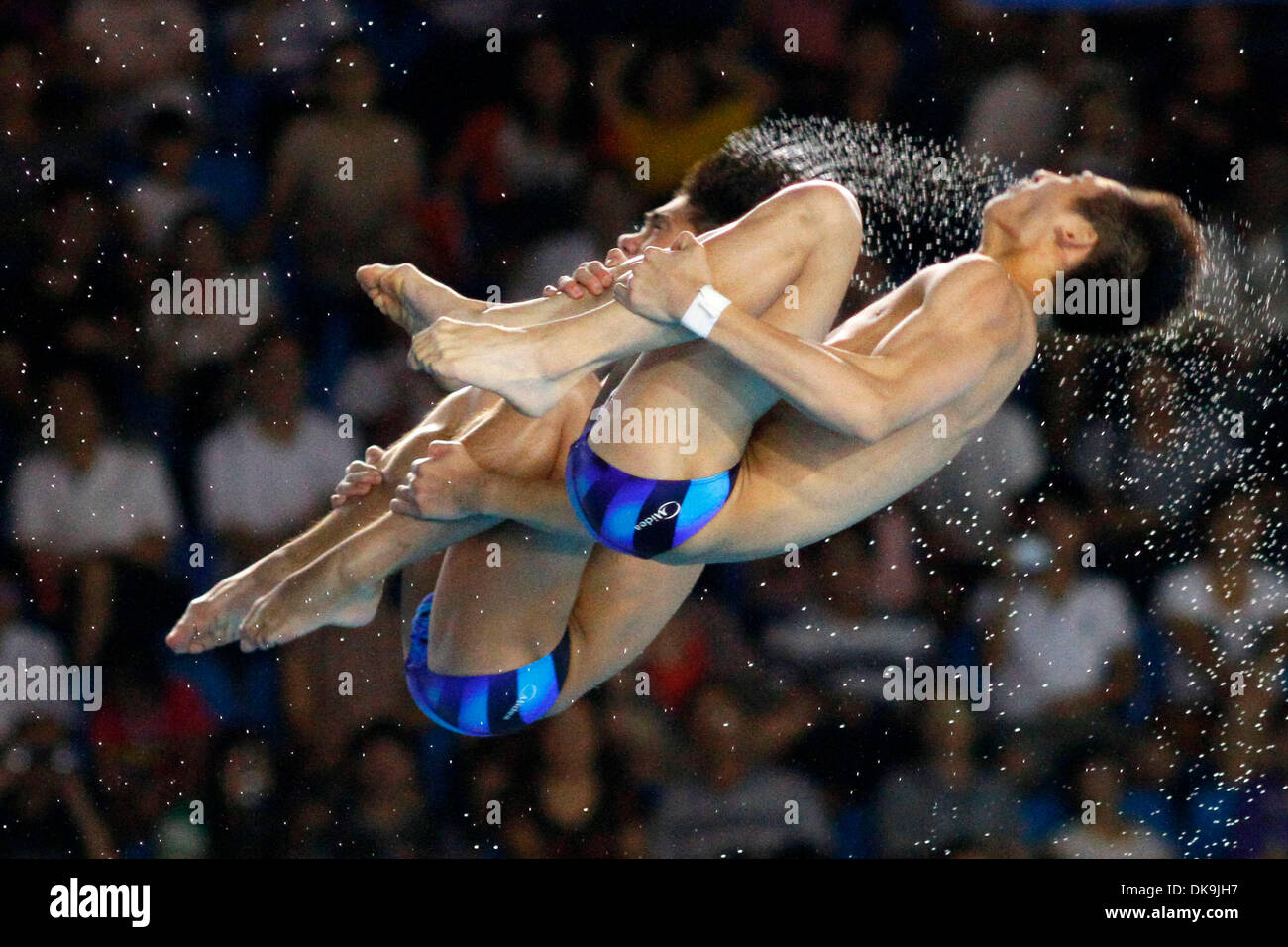 Aug. 22, 2011 - Shenzhen, China - LIN YUE and HUO LIANG youth diving sensations at the 2008 Beijing Olympics, took the gold again in the men's 10 meter synchronized platform competition at the 26th Summer Universiade (World University Games) in Shenzhen. (Credit Image: © Jeremy Breningstall/ZUMAPRESS.com) Stock Photo
