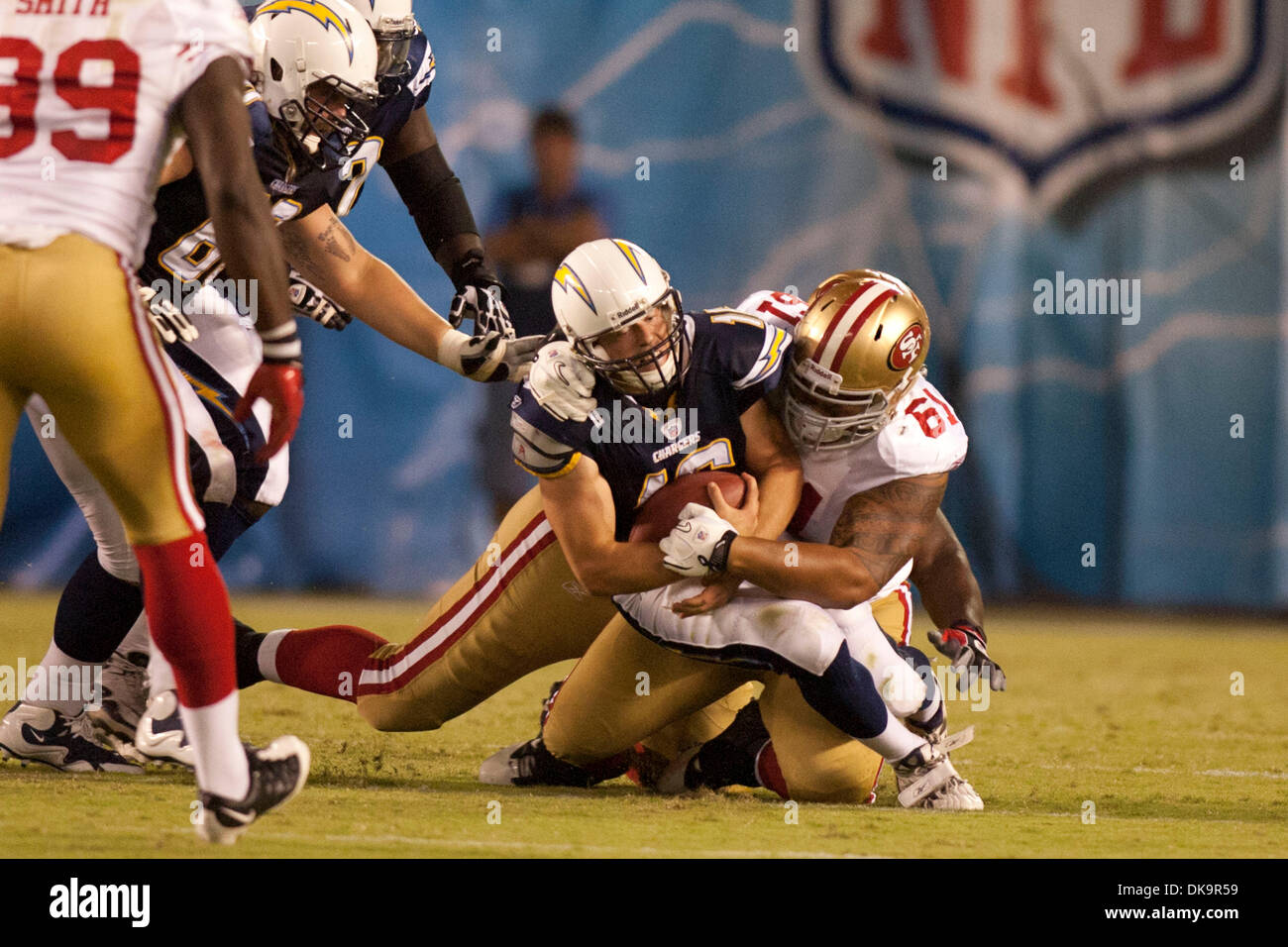 Sep. 01, 2011 - San Diego, California, U.S. - San Diego Chargers quarterback SCOTT TOLZIEN (16) is sacked by San Francisco 49ers nose tackle SEALVER SILIGA (61) against the San Francisco 49ers in a pre-season game played in Qualcomm Stadium in San Diego. The San Francisco 49ers won 20-17. (Credit Image: © Wally Nell/ZUMAPRESS.com) Stock Photo