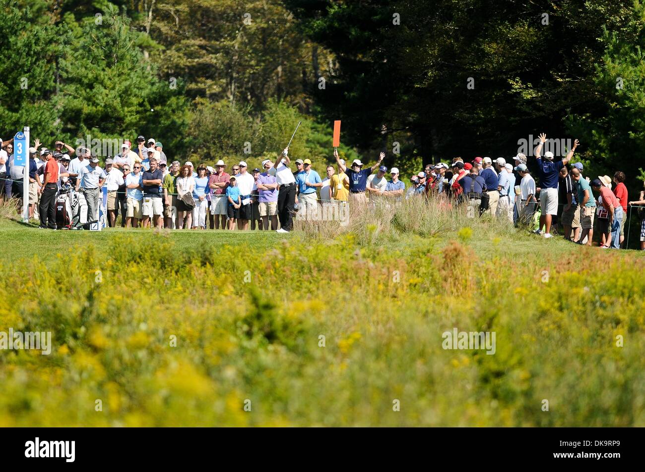 Sept. 2, 2011 - Norton, Massachusetts, U.S - Fans watch as local favorite Keegan Bradley hits his tee shot on the third hole during the first round at the Deutsche Bank Championship at the TPC Boston. (Credit Image: © Geoff Bolte/Southcreek Global/ZUMAPRESS.com) Stock Photo