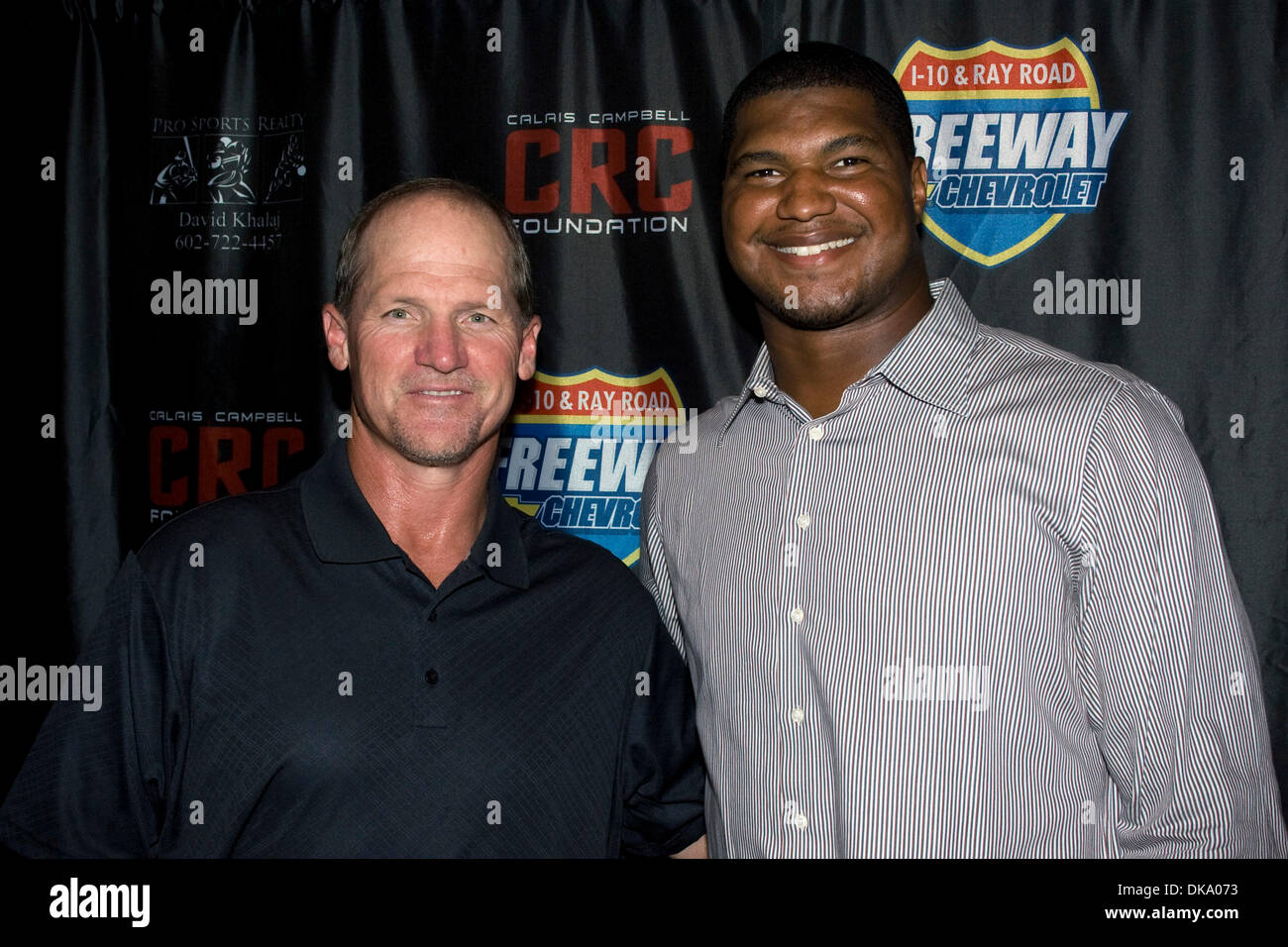 Sept. 5, 2011 - Chandler, Arizona, U.S - Calais Campbell defensive end of the Arizona Cardinals celebrates his 25 birthday at Flemings Prime Steakhouse & Wine Grill in Chandler, AZ with head coach Ken Whisenhunt in support of his CRC Foundation, a non-profit that seeks to empower and provide self-awarenessfor future leaders. (Credit Image: © Gene Lower/Southcreek Global/ZUMAPRESS.c Stock Photo