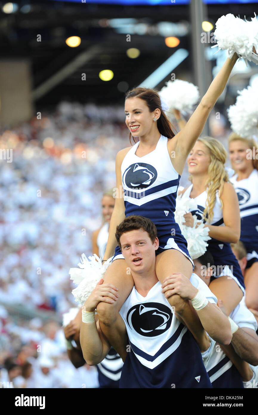 Sept. 10, 2011 - State College, Pennsylvania, United States of America - Penn State cheerleaders switch ends of the field for the final quarter of the Alabama - Penn State game in Happy Valley.  Alabama defeated Penn State by a score of 27 - 11. (Credit Image: © Brian Freed/Southcreek Global/ZUMAPRESS.com) Stock Photo