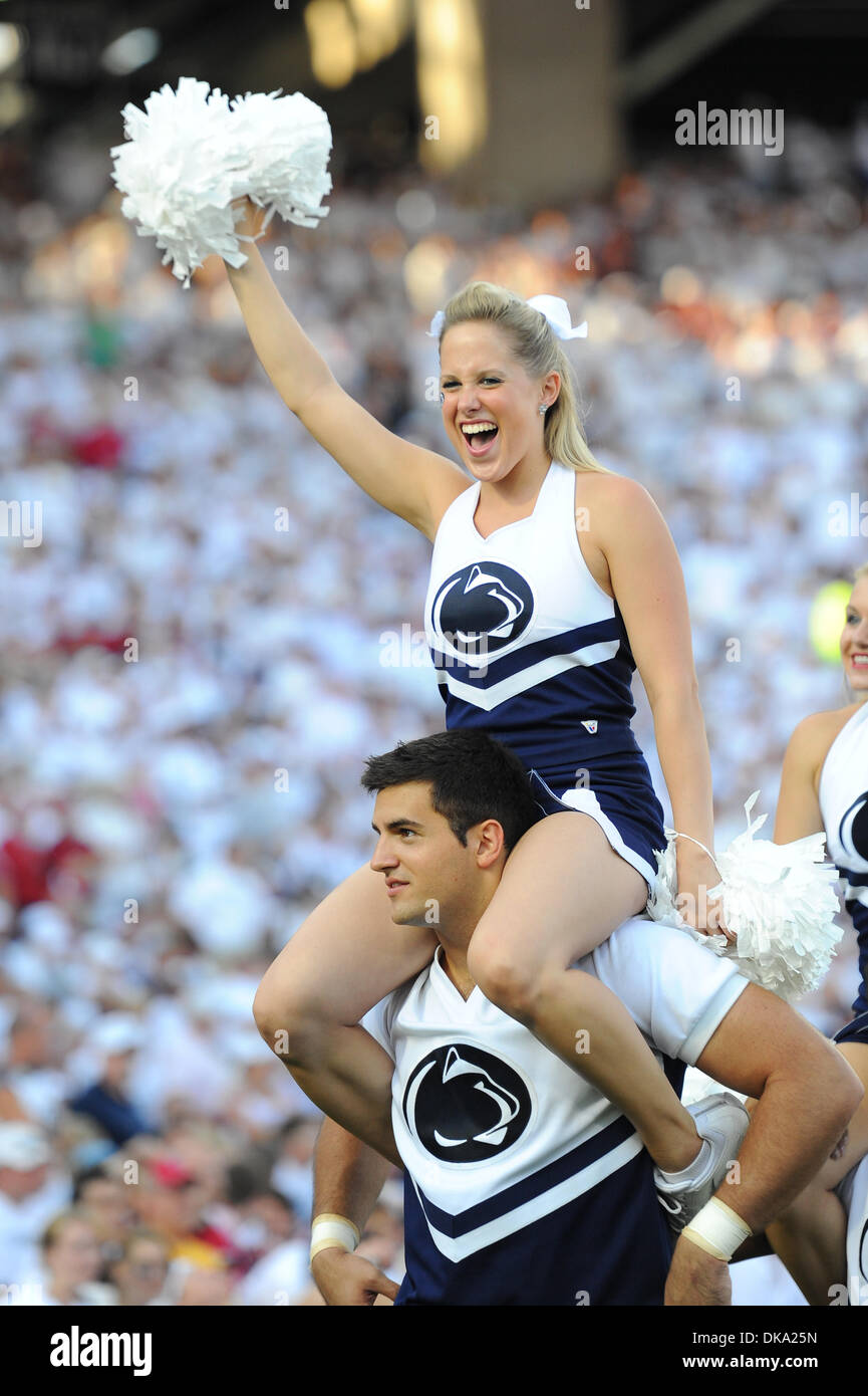 Sept. 10, 2011 - State College, Pennsylvania, United States of America - Penn State cheerleaders switch ends of the field for the final quarter of the Alabama - Penn State game in Happy Valley.  Alabama defeated Penn State by a score of 27 - 11. (Credit Image: © Brian Freed/Southcreek Global/ZUMAPRESS.com) Stock Photo