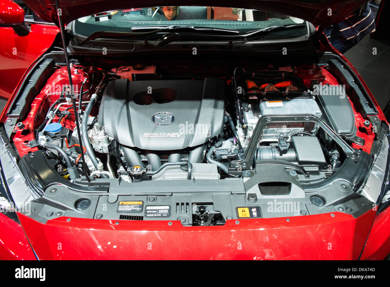 Mazda Axela (mazda 3) hybrid car engine  detail at Tokyo Motor Show 2013 in Japan Stock Photo