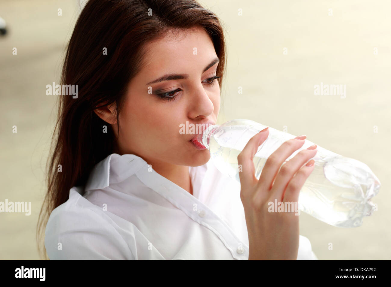 Closeup portrait of a woman drinking water Stock Photo Alamy