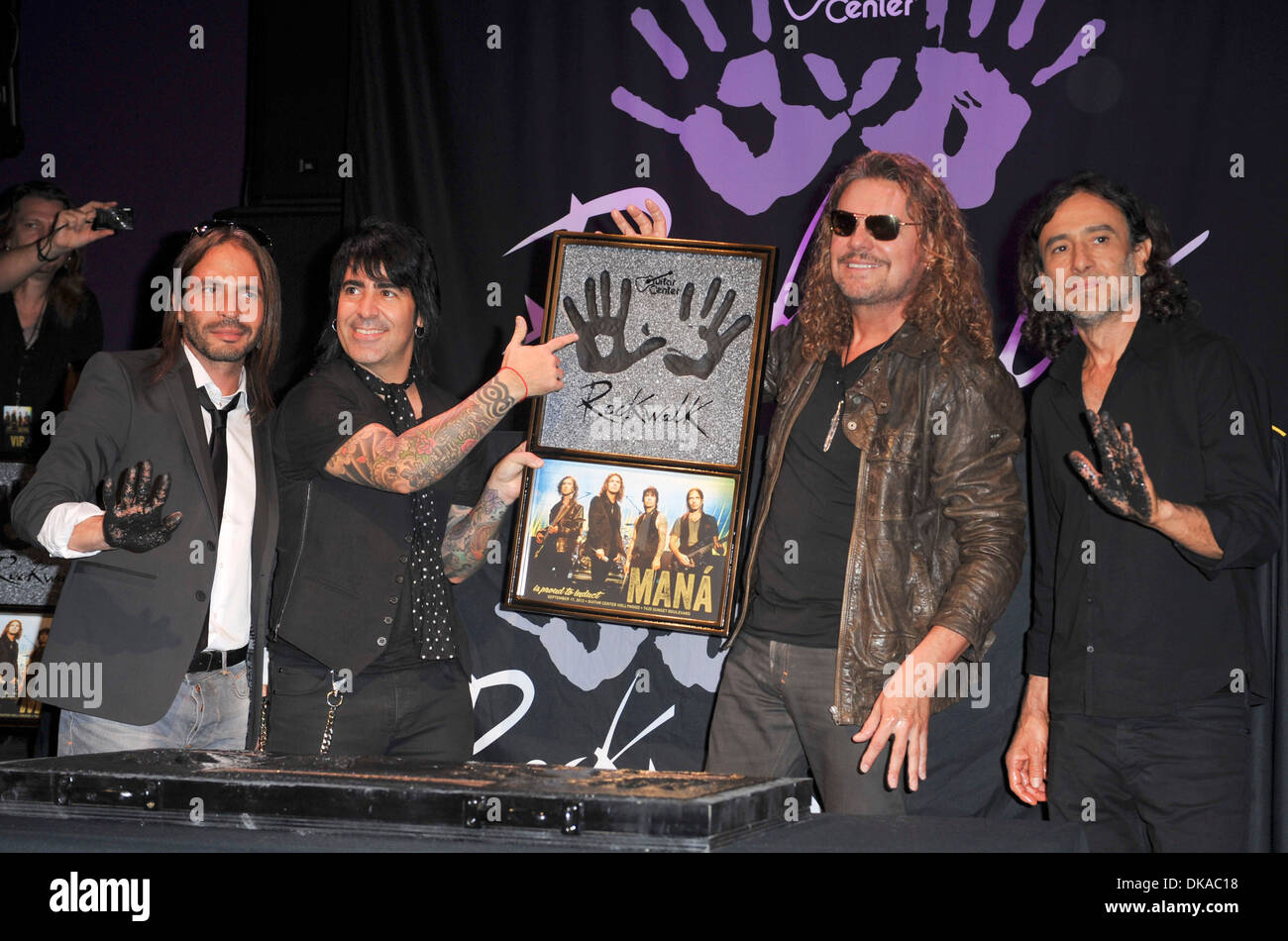 Fher Olvera Multi-Platinum and Grammy Winning Mexican Rock band 'Mana' are  inducted into Guitar Center's Historic RockWalk at Stock Photo - Alamy