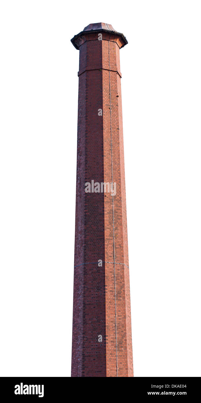 Tall, industrial red brick chimney stack isolated on a white background. Stock Photo