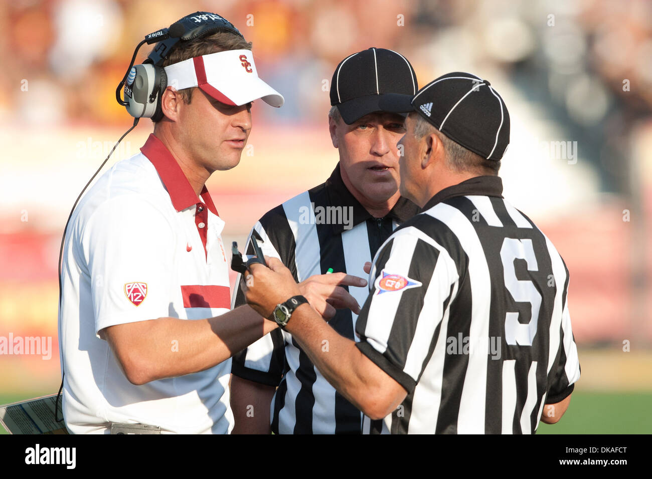 Sept. 17, 2011 - Los Angeles, California, U.S - USC Head Coach Lane Kiffin argues a call with the referee during the NCAA Football game between the Syracuse Oranges and the USC Trojans at Los Angeles Memorial Coliseum. USC went on to defeat Syracuse with a final score of 38-17. (Credit Image: © Brandon Parry/Southcreek Global/ZUMAPRESS.com) Stock Photo