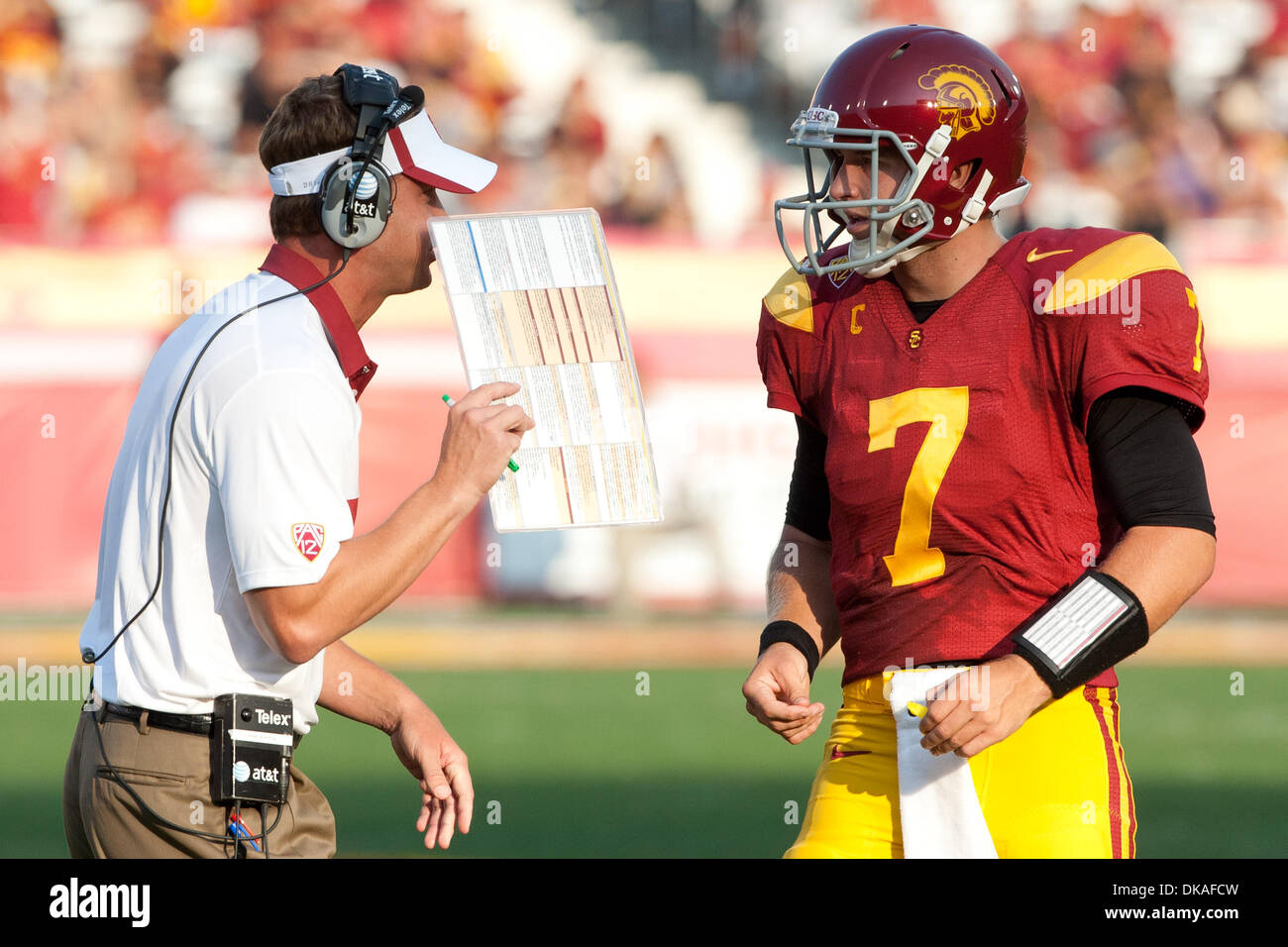 Sept. 17, 2011 - Los Angeles, California, U.S - USC Head Coach Lane Kiffin has a quick word with USC Trojans quarterback Matt Barkley #7 during the NCAA Football game between the Syracuse Oranges and the USC Trojans at Los Angeles Memorial Coliseum. USC went on to defeat Syracuse with a final score of 38-17. (Credit Image: © Brandon Parry/Southcreek Global/ZUMAPRESS.com) Stock Photo