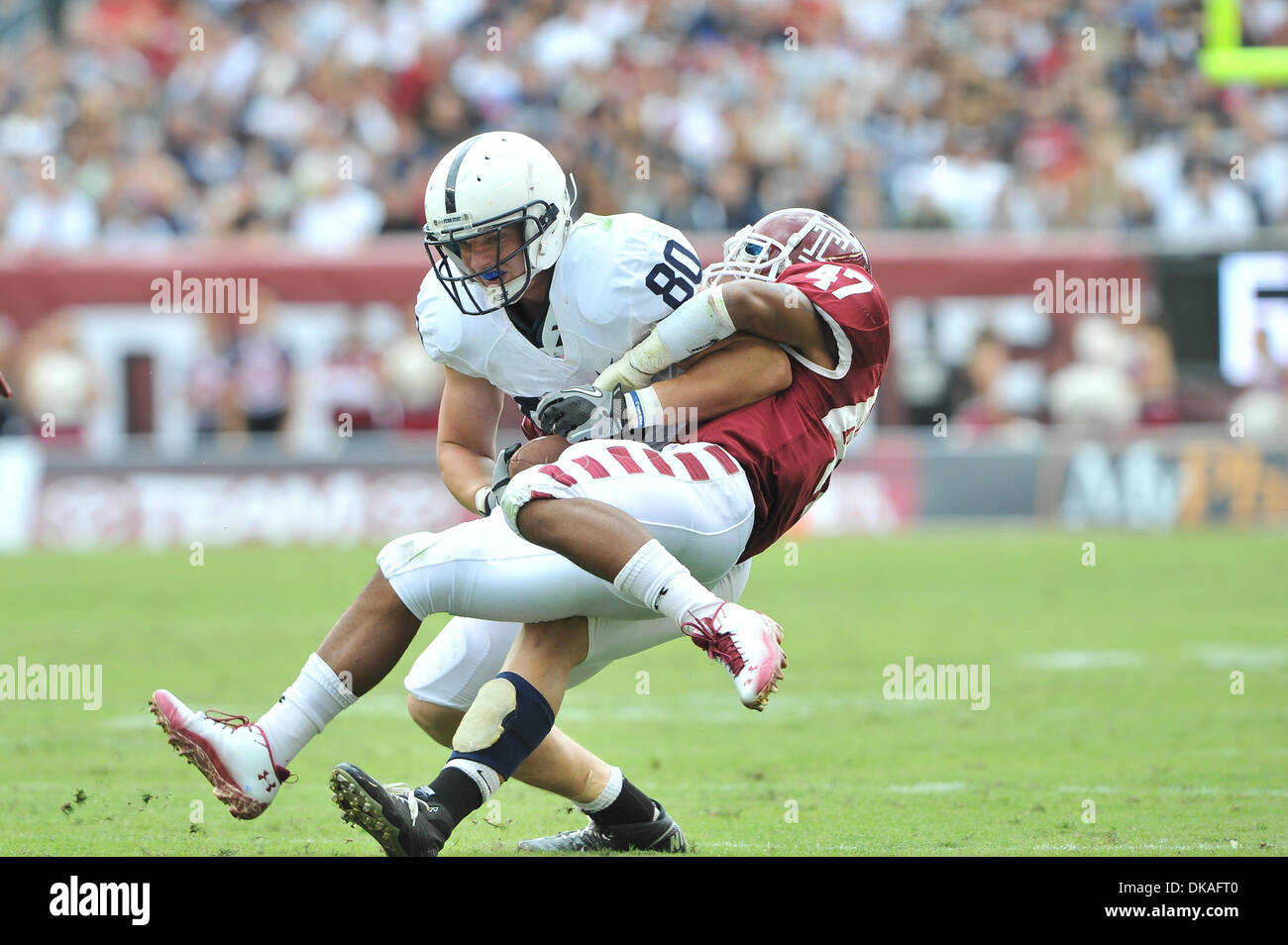 Sept. 17, 2011 - Philadelphia, Pennsylvania, U.S - Penn State Nittany Lions tight end Andrew Szczerba (80) is tackled by Temple Owls defensive back Anthony Robey (47) after a nice catch. Penn State defeated Temple by a score of  14-10 in a comeback win. The  game is being  being played at Lincoln Financial Feld in Philadelphia, Pennsylvania (Credit Image: © Mike McAtee/Southcreek G Stock Photo