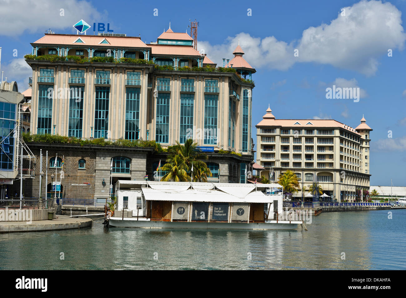 Caudan Waterfront with restaurants, bars, the IBL building and Labourdonais Hotel, Port Louis, Mauritius. Stock Photo