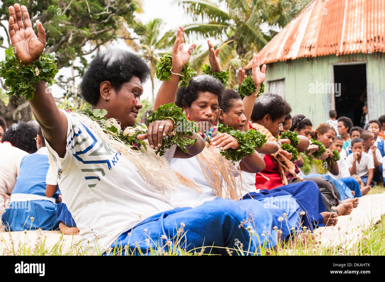 A meke, as dancers from all three villages on the tropical island of Fulaga farewell divers who have been diving for beche de mer (sea cucumber). Fiji Stock Photo