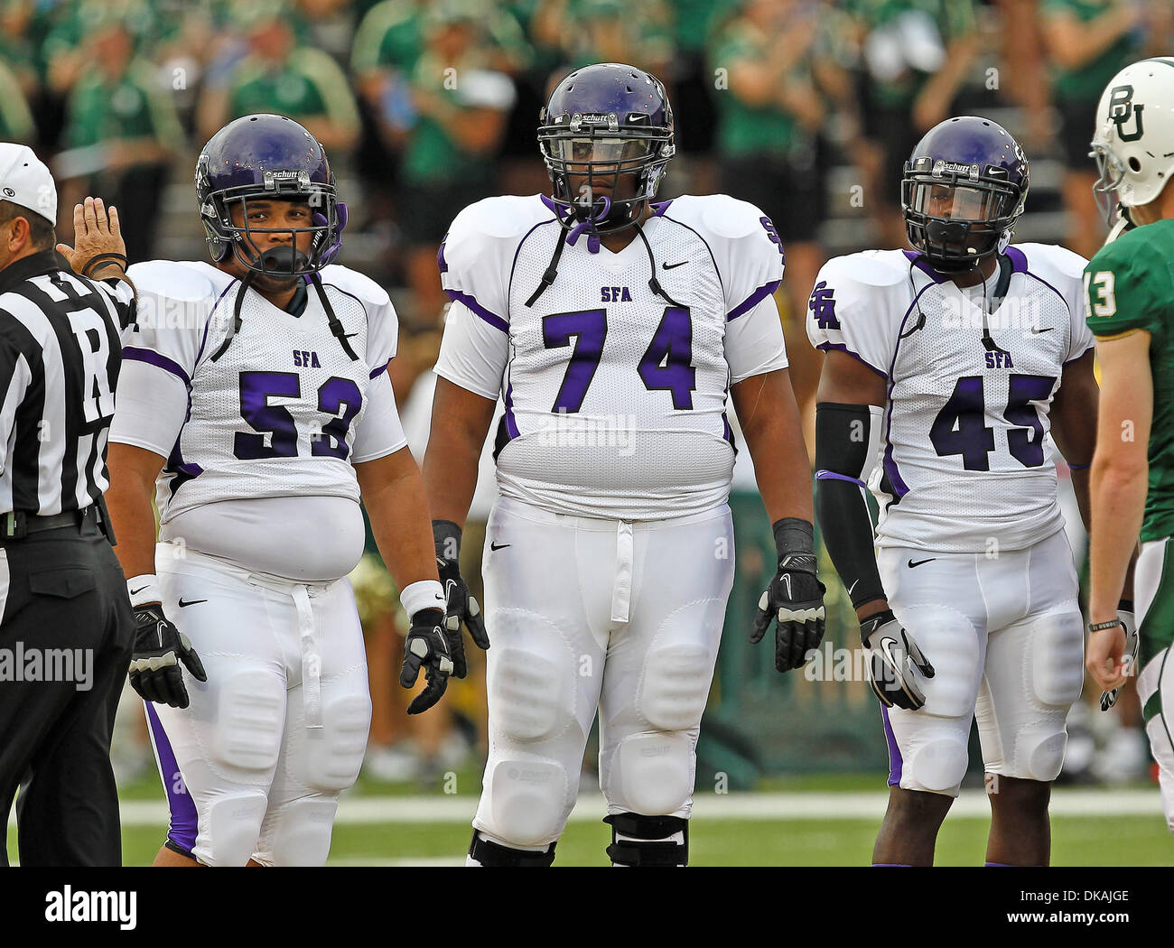 Sept. 17, 2011 - Waco, Texas, United States of America - Stephen F. Austin Lumberjacks defensive lineman Wayne Thompson (53), Stephen F. Austin Lumberjacks linebacker Derrick Choice (45) and Stephen F. Austin Lumberjacks offensive linesman Willie Watkins (74) in action during the game between the Stephen F. Austin Lumberjacks and the Baylor Bears at the Floyd Casey Stadium in Waco, Stock Photo
