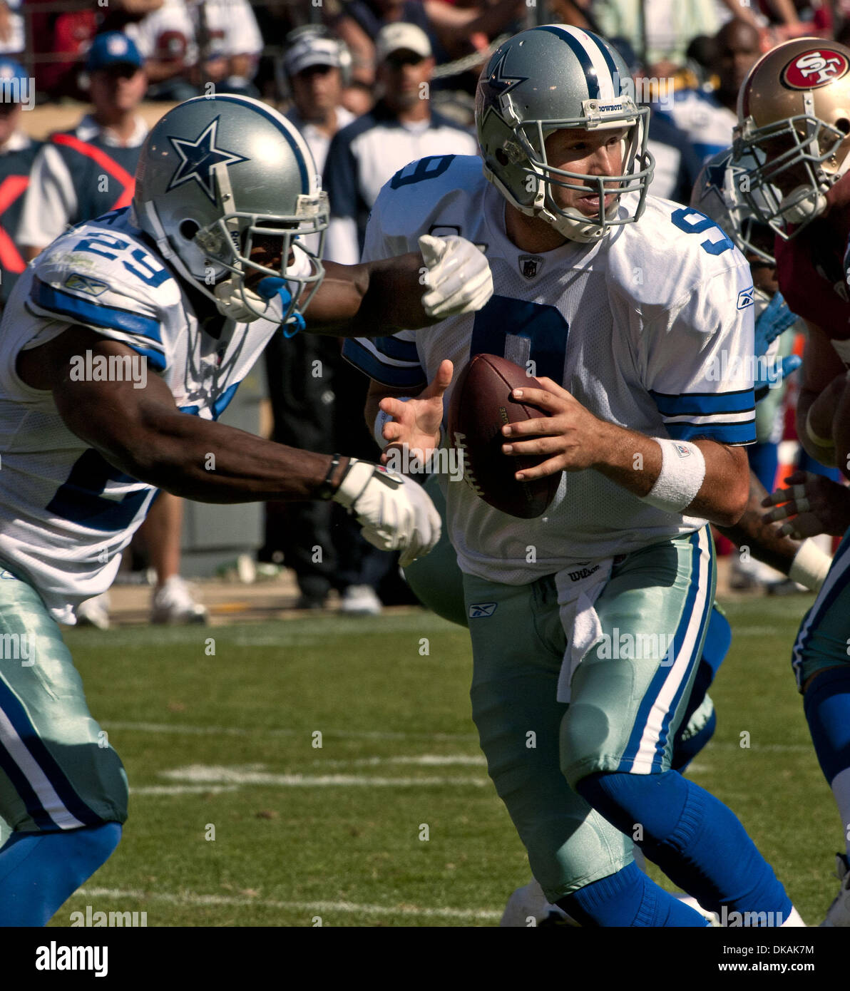 Dallas Cowboys quarterback Tony Romo (9) puts his hand to his face