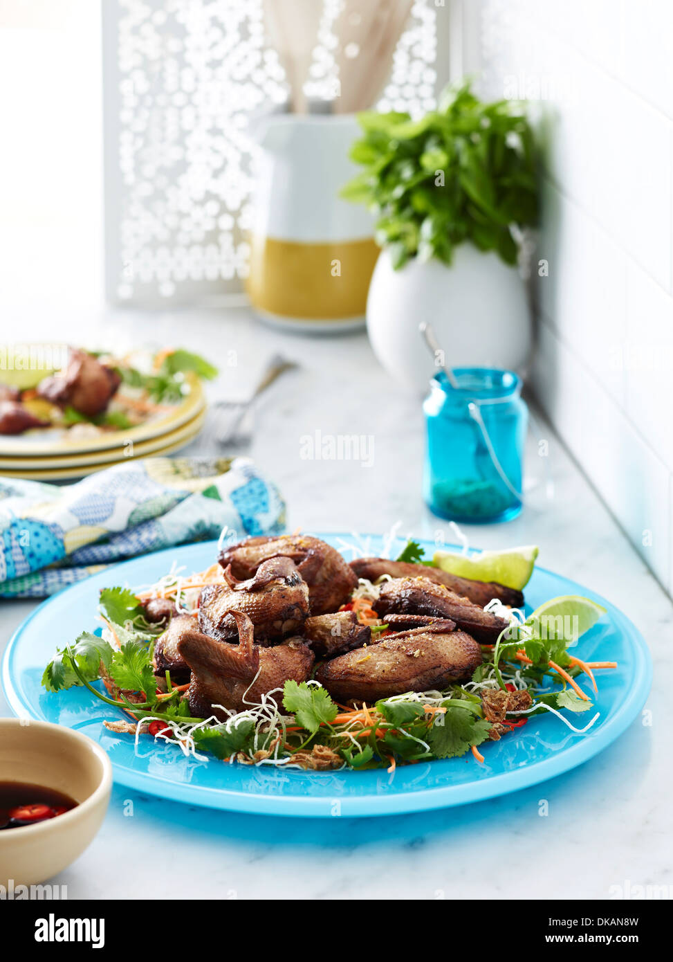 Plate of crispy Chinese style chicken wings Stock Photo