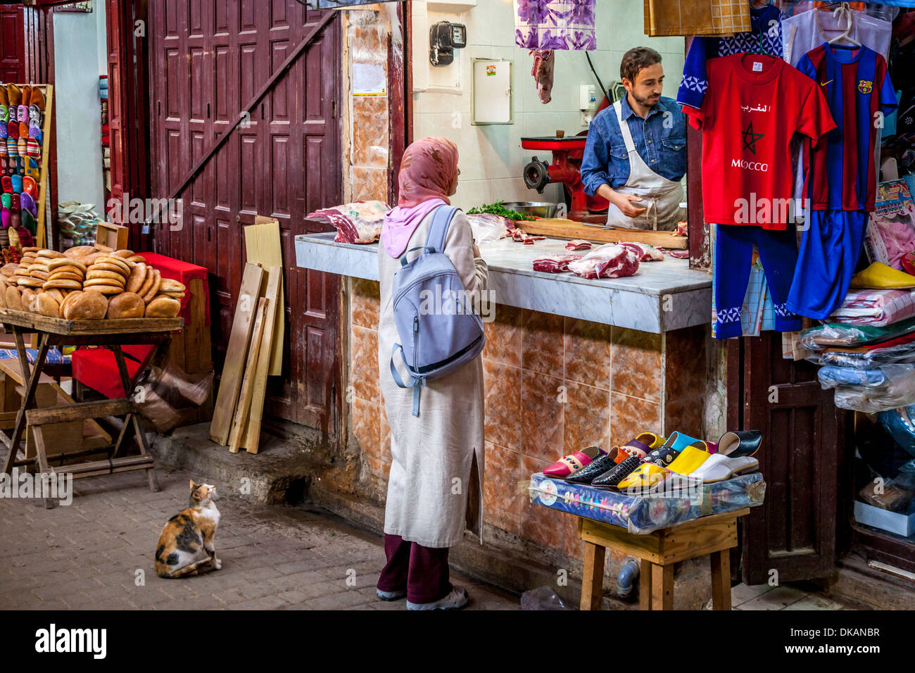 A Woman Shops For Meat In The Medina (Old City) Fez, Morocco Stock Photo