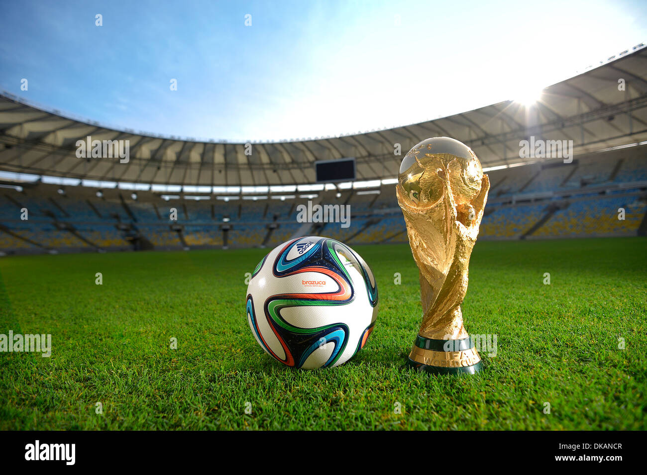 Adidas Brazuca, official match ball of the FIFA World Cup Brasil 2014, and the official World Cup Trophy in Maracana Stadium Stock Photo