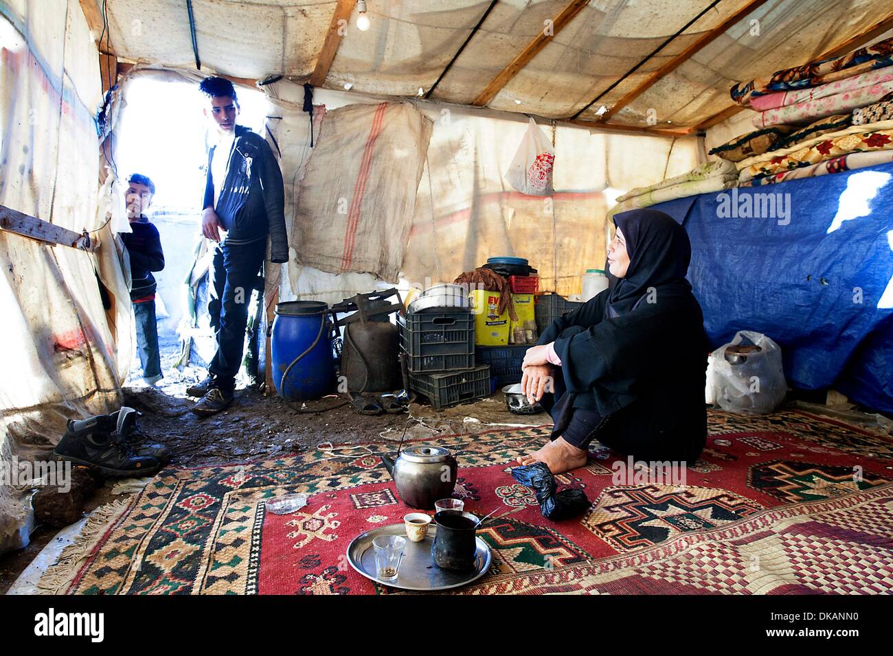 This family fled from Syria to Lebanon , in the first six weeks the children were completely on their own. The father died in the war and the mother could not leave her parents alone. She sold the last cow and sent the six children off alone . The oldest d Stock Photo