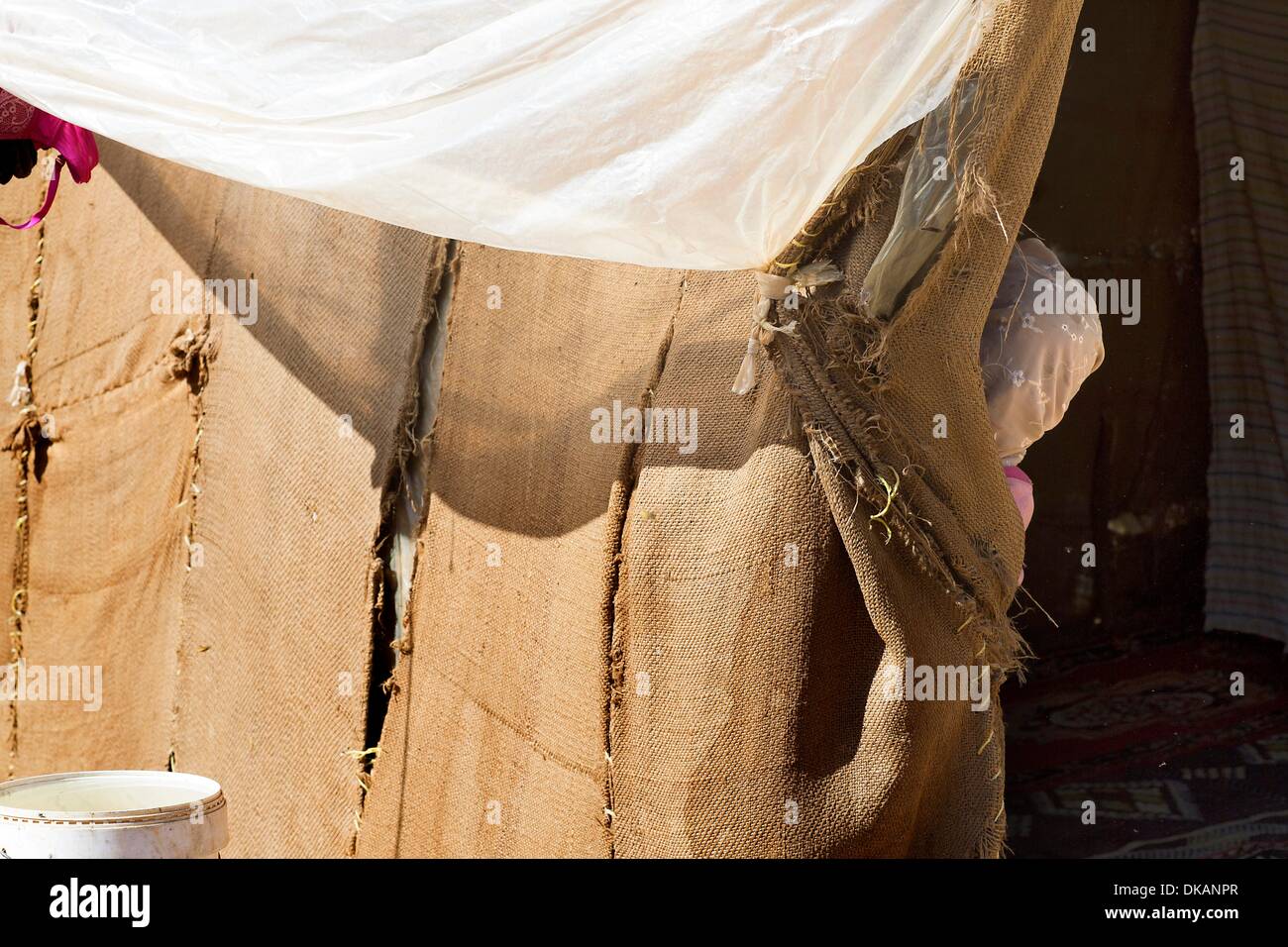 Daily new families come to the Beeka level in Lebanon, flee from war and destruction in neighboring Syria. Among them are always many children and young people. Different organizations try to offer the refugees a temporary home. Caritas has distributed in Stock Photo