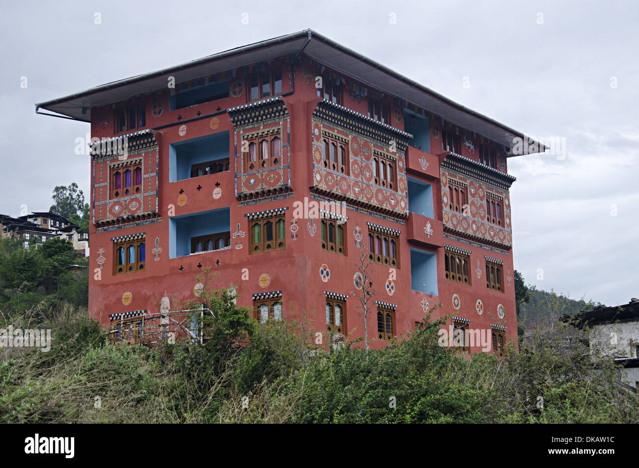 View of an apartment. Has paintings on their exterior wall. Lobesa. Punakha District. Bhutan Stock Photo