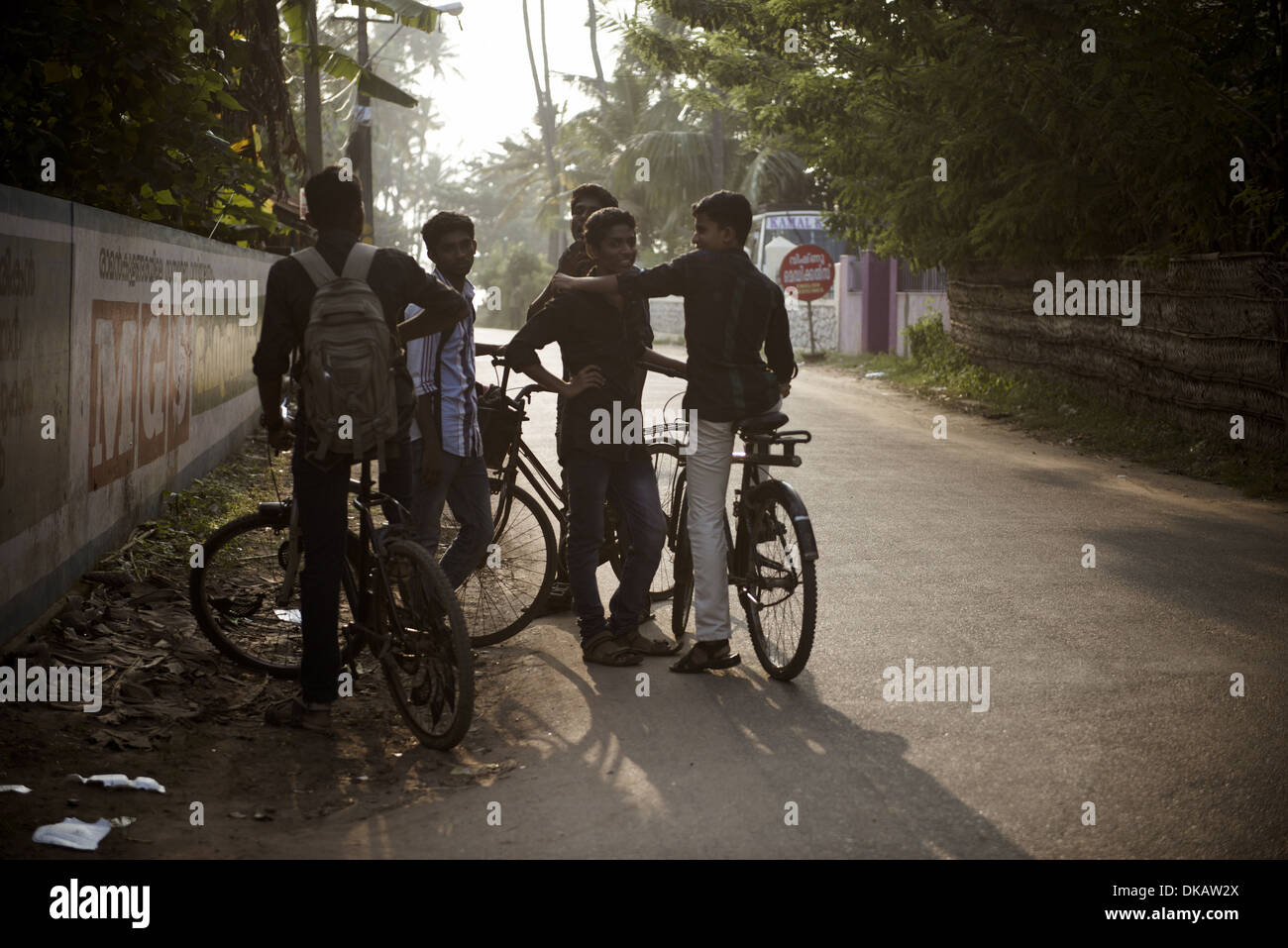 Teenagers with bikes, Kollam, India. November 2013 Stock Photo