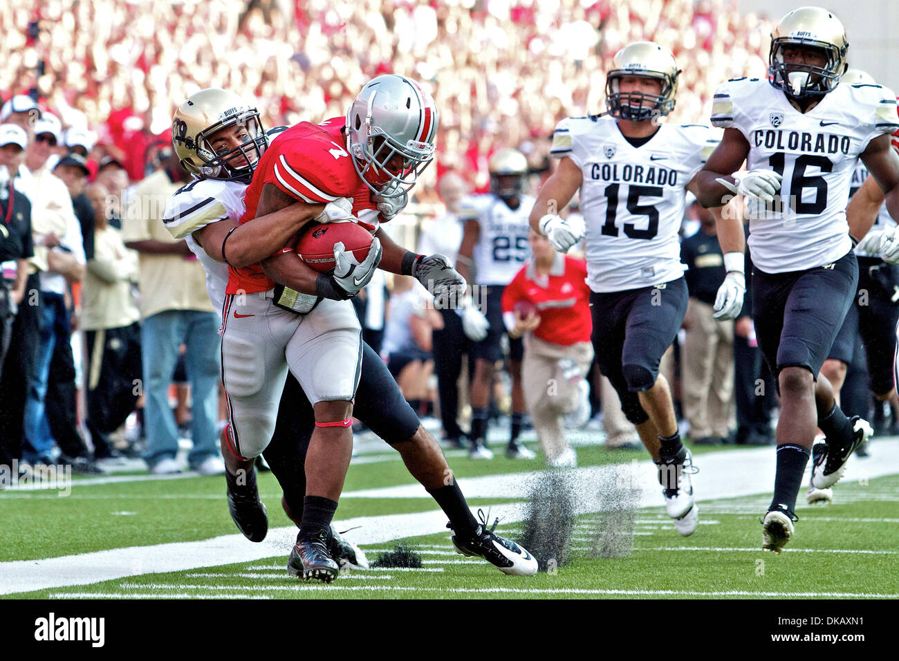Sept. 24, 2011 - Columbus, Ohio, U.S - Ohio State Buckeyes running back Jordan Hall (7) is brought down by Colorado Buffaloes defensive back Terrel Smith (41) after a 90 yard punt return in the third quarter of the game between Colorado and Ohio State at Ohio Stadium, Columbus, Ohio. Ohio State defeated Colorado 37-17. (Credit Image: © Scott Stuart/Southcreek Global/ZUMAPRESS.com) Stock Photo