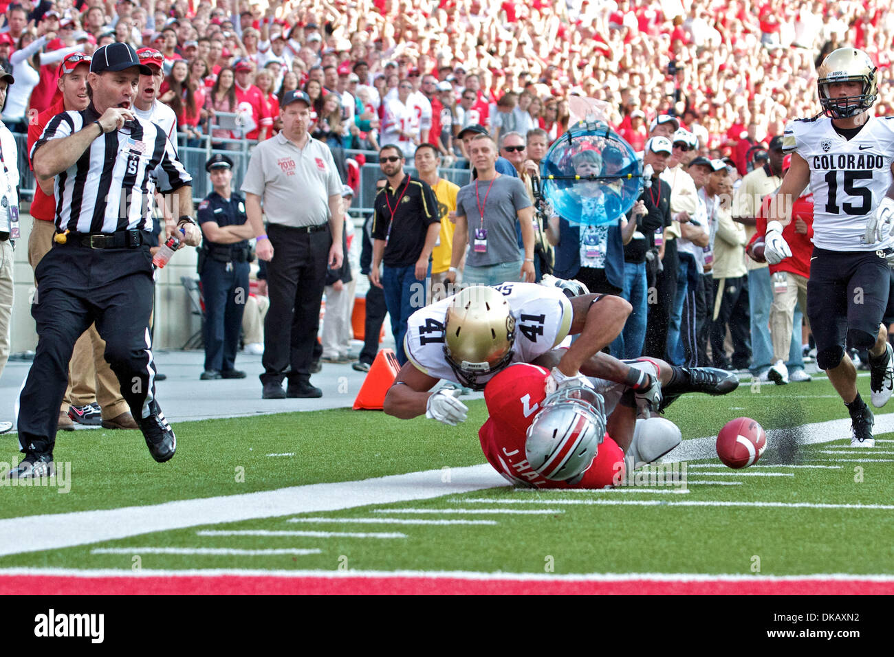 Sept. 24, 2011 - Columbus, Ohio, U.S - The ball is knocked loose after Ohio State Buckeyes running back Jordan Hall (7) is taken down by Colorado Buffaloes defensive back Terrel Smith (41) on a punt return in the third quarter of the game between Colorado and Ohio State at Ohio Stadium, Columbus, Ohio. Ohio State defeated Colorado 37-17. (Credit Image: © Scott Stuart/Southcreek Glo Stock Photo