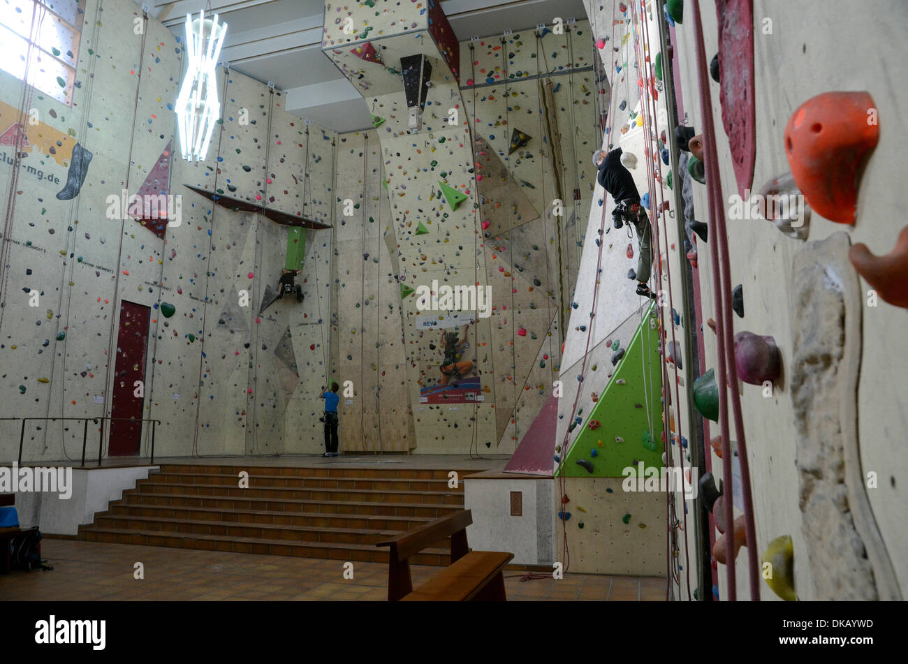People are climbing up a wall in the former church St. Peter in ...