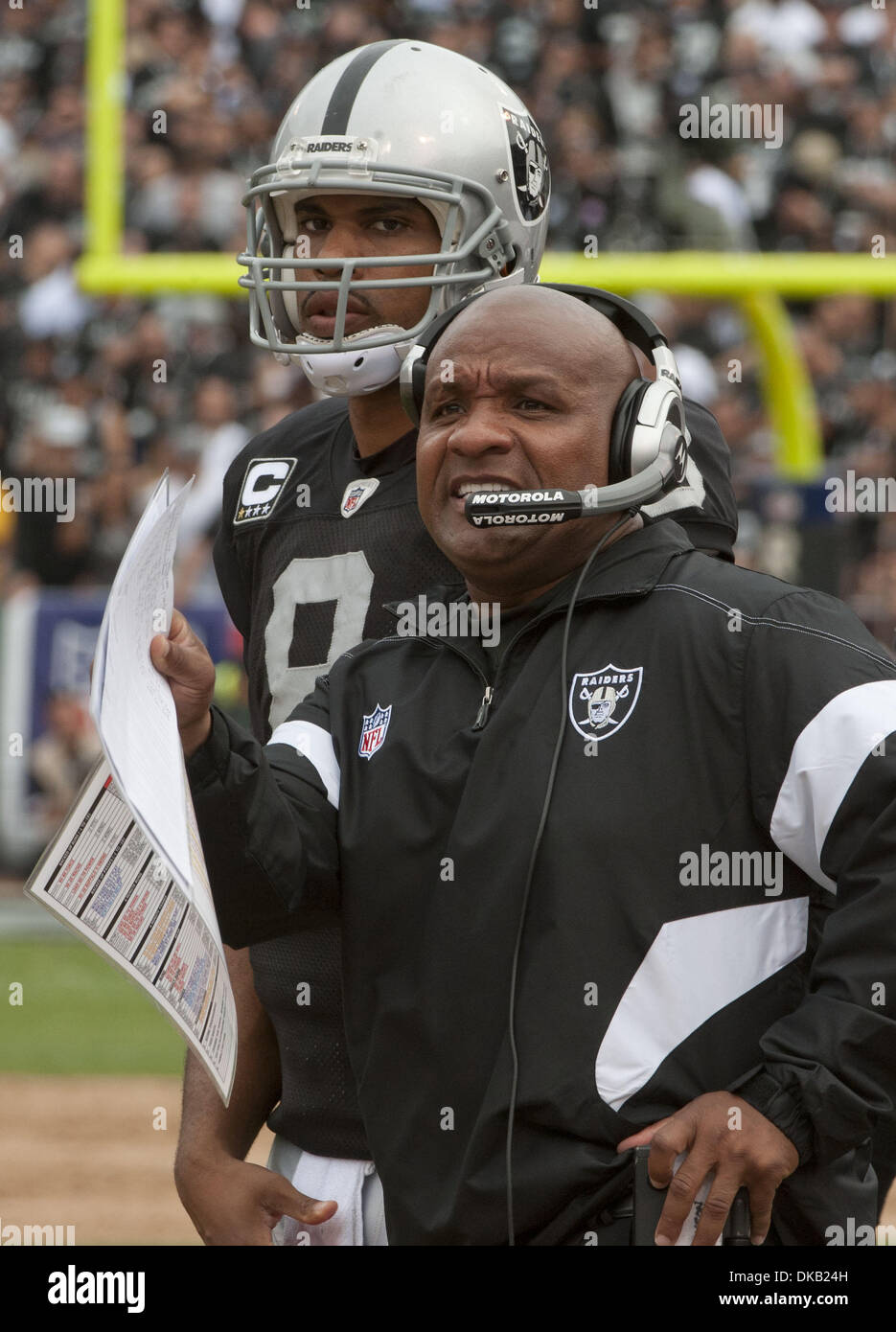 Oakland Raiders quarterback Jason Campbell (8) walks off the field