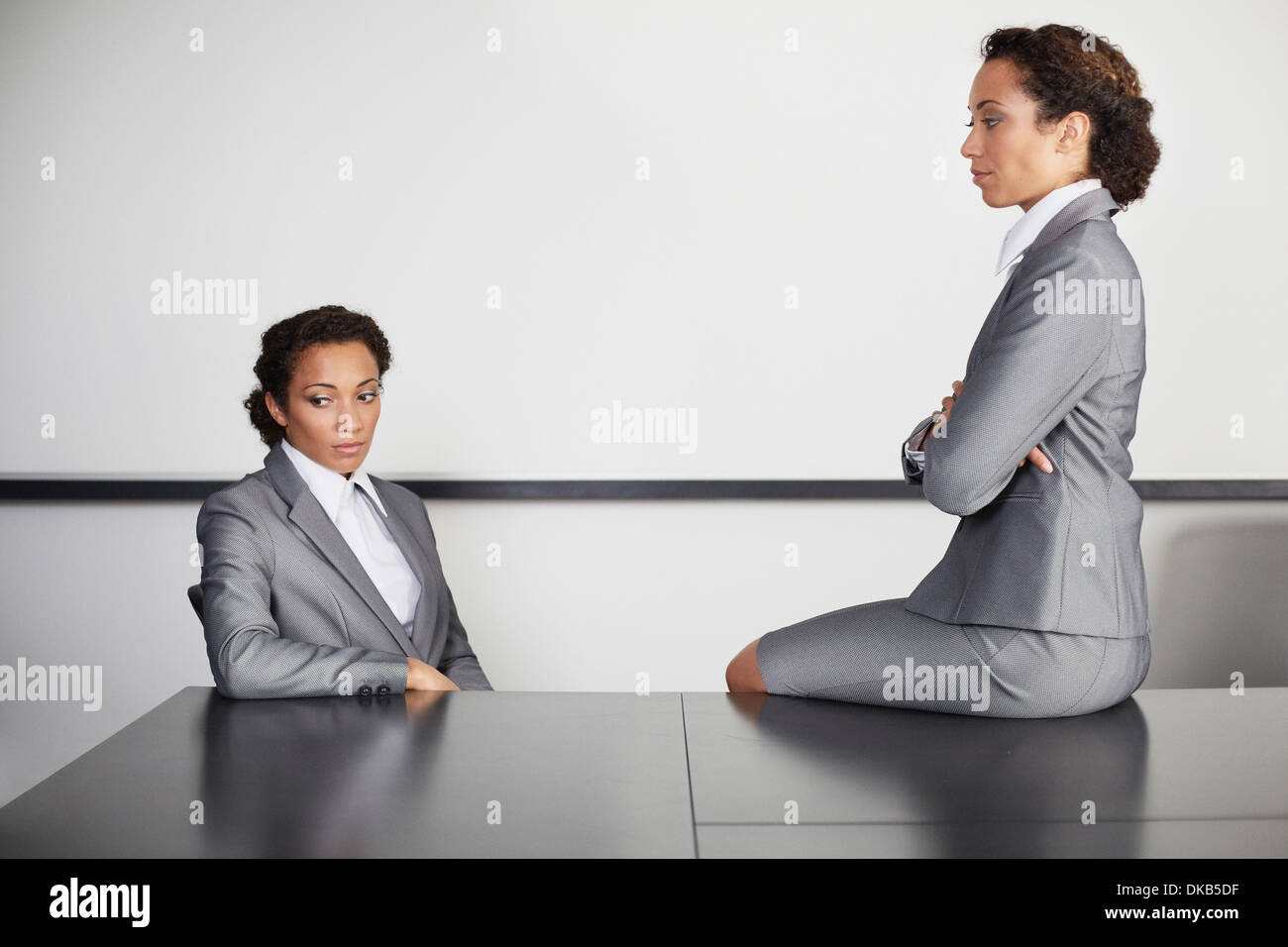 Businesswomen in office, multiple image Stock Photo