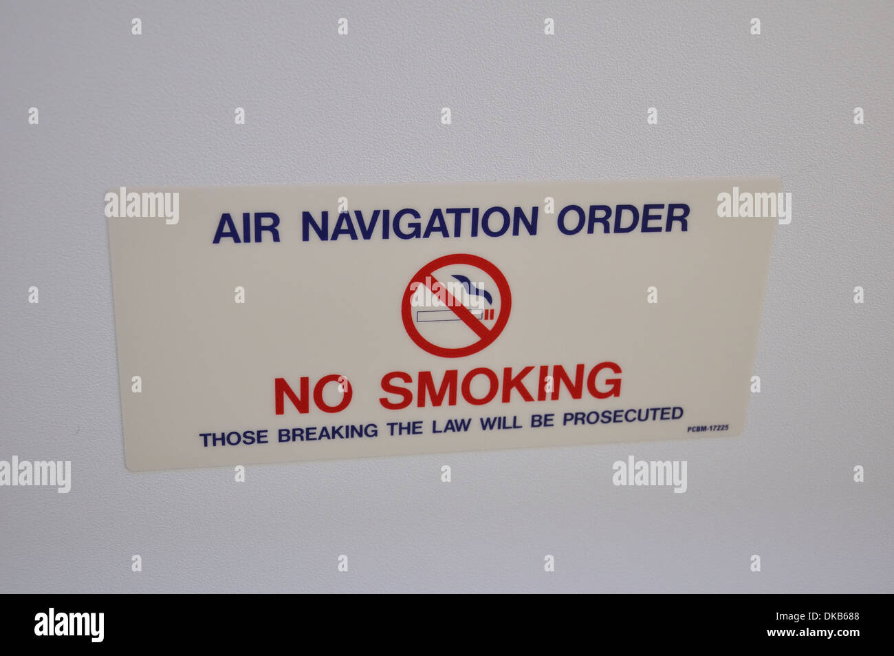 No Smoking sign onboard an airplane Stock Photo