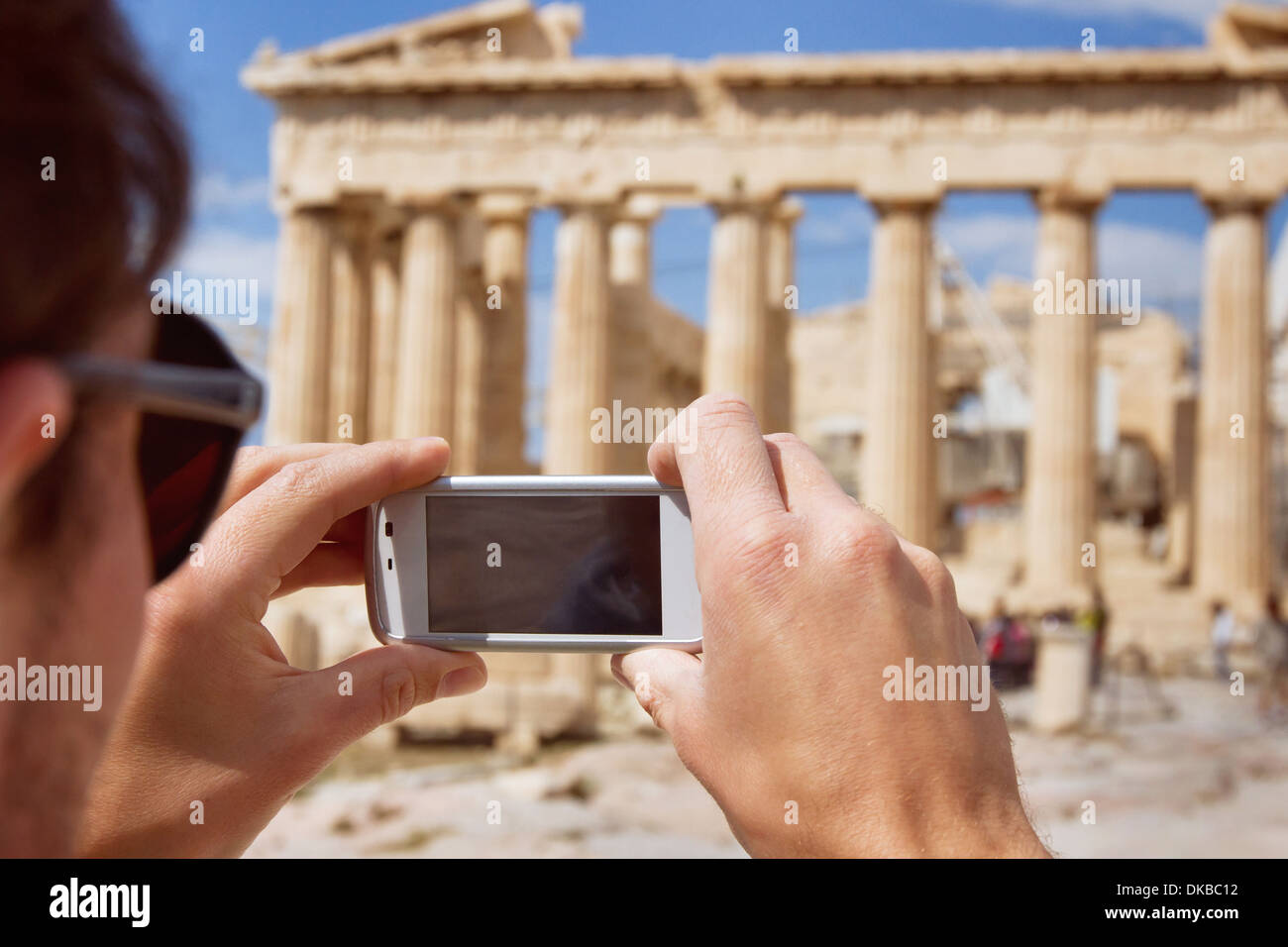 tourist taking photo of Parthenon, Acropolis, Greece Stock Photo