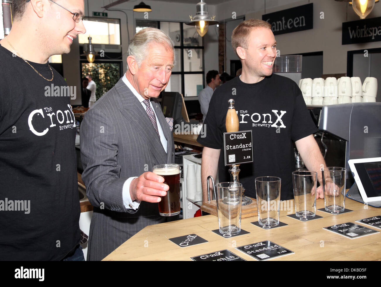 Prince Charles trying beer brewed by Cronx brewery Prince Charles and Camilla Duchess of Cornwall visit Croydon London England Stock Photo
