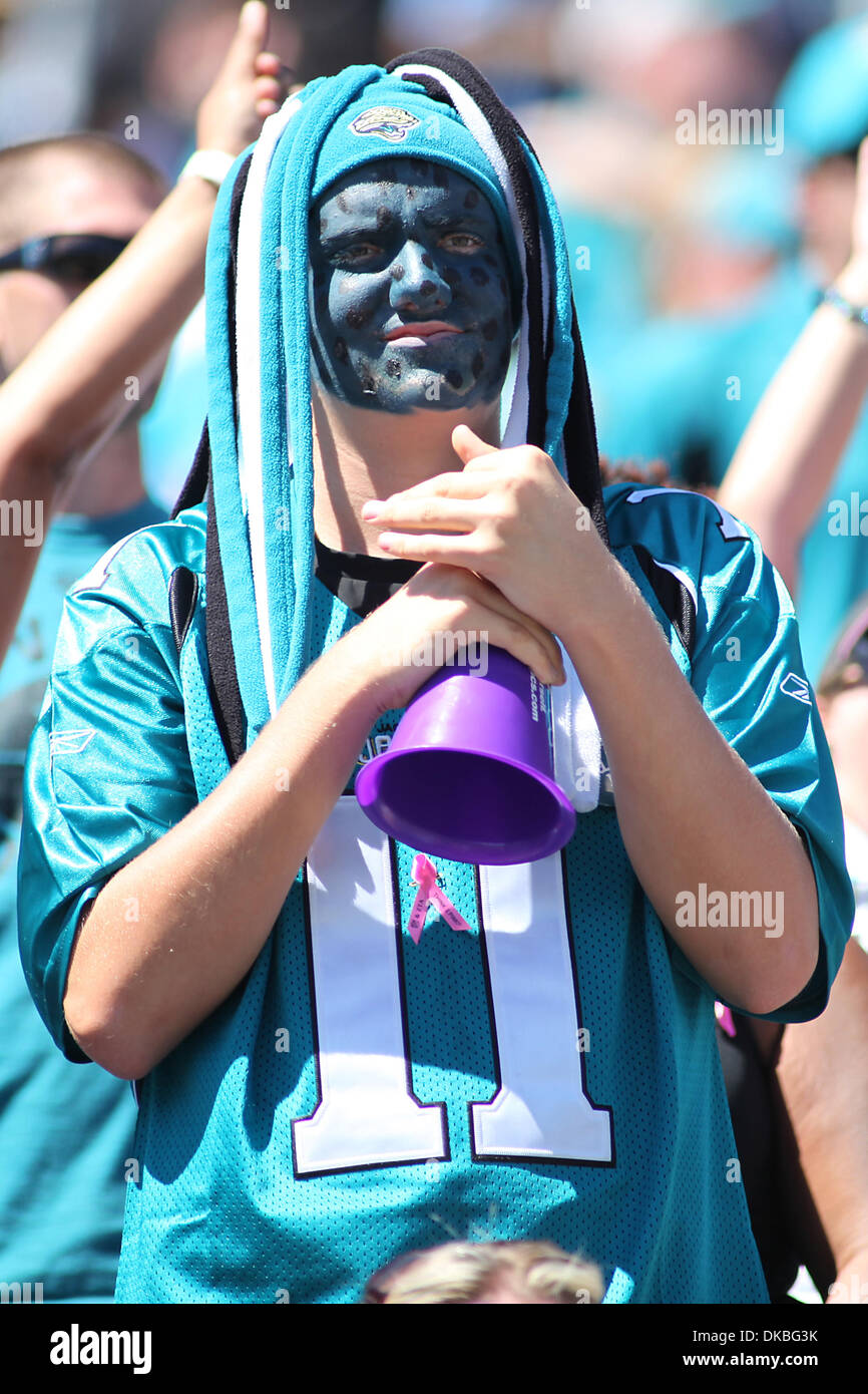 Jacksonville Jaguars vs. Miami Dolphins. Fans support on NFL Game.  Silhouette of supporters, big screen with two rivals in background Stock  Photo - Alamy