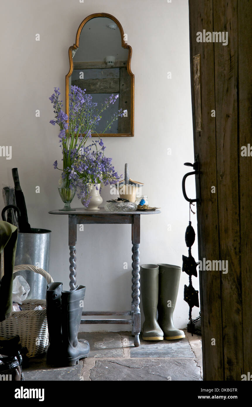 Wellington boots in hallway, Wales, UK Stock Photo