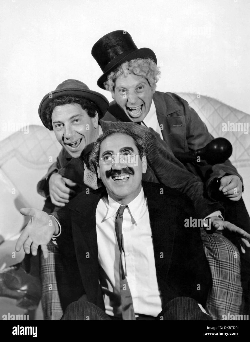 A NIGHT AT THE OPERA 1935 MGM film with he Marx Brothers. from top: Harpo, Chico, Groucho Stock Photo