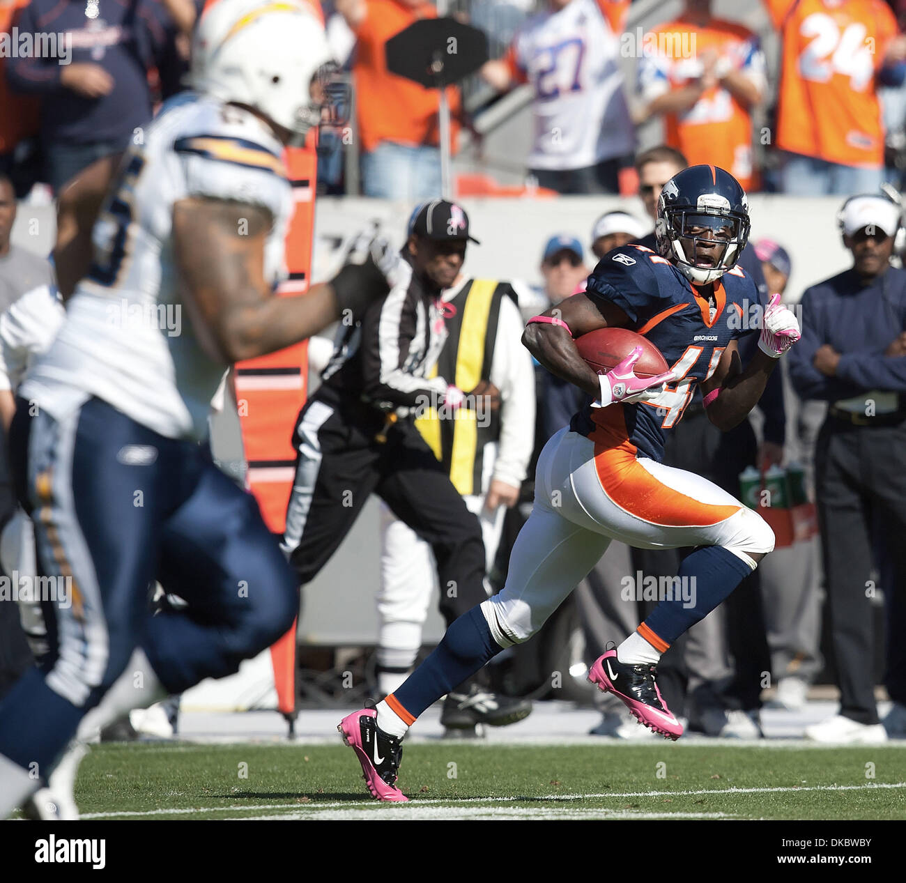 Oct. 9, 2011 - Denver, Colorado, U.S. - Broncos CB CASSIUS VAUGHN runs for a TD in the 1st. half after intercepting a pass against the Chargers at Sports Authority Field at Mile High Sunday afternoon. Chargers beat the Broncos 29-24 (Credit Image: © Hector Acevedo/ZUMAPRESS.com) Stock Photo