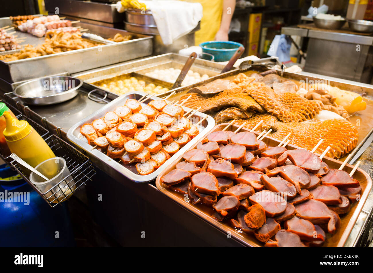 Hong kong street snack at night, with pork and stew beef. Stock Photo