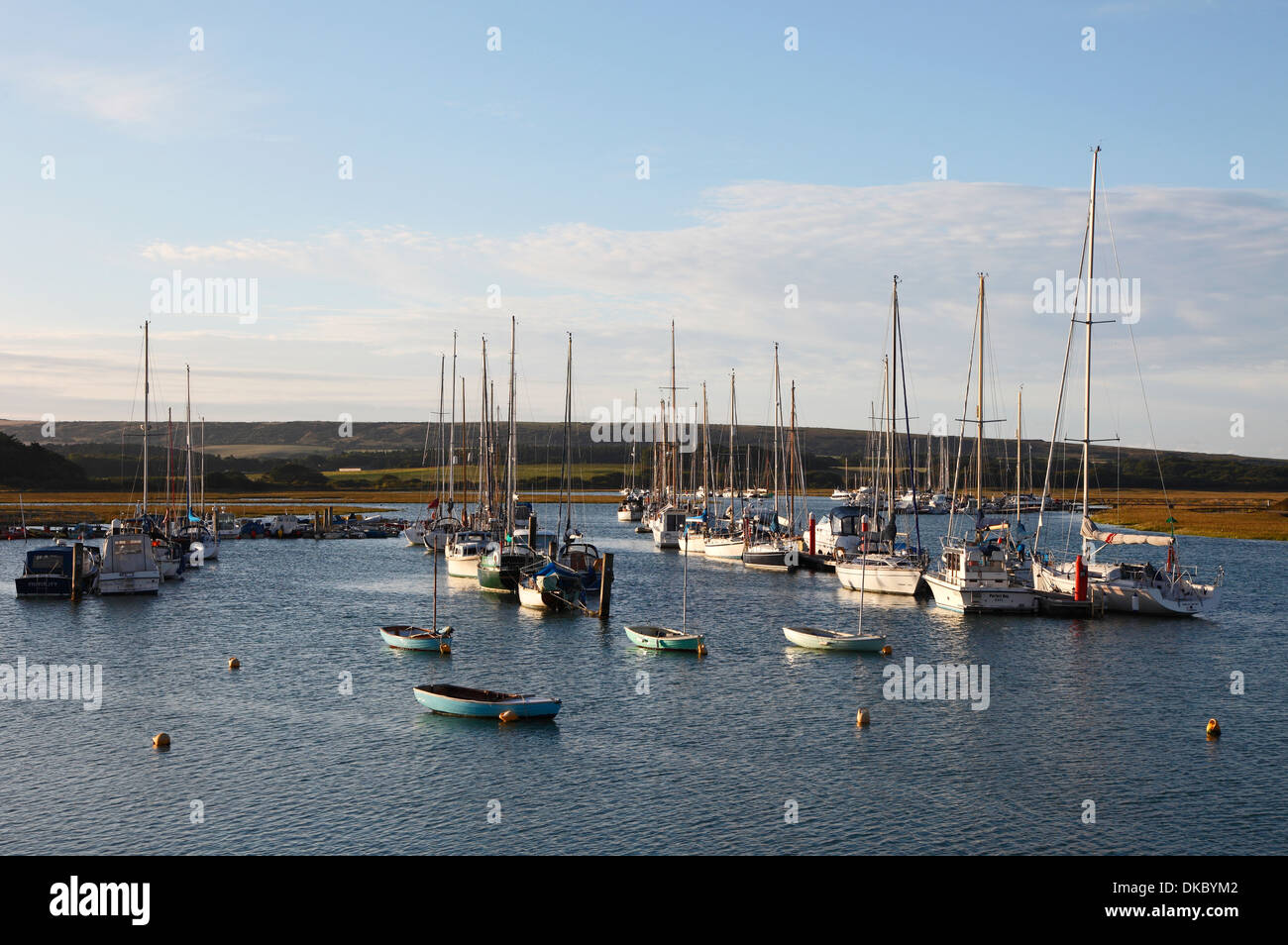 Sail boats tied up in river Yar estuary Yarmouth Isle of Wight Hampshire England Stock Photo